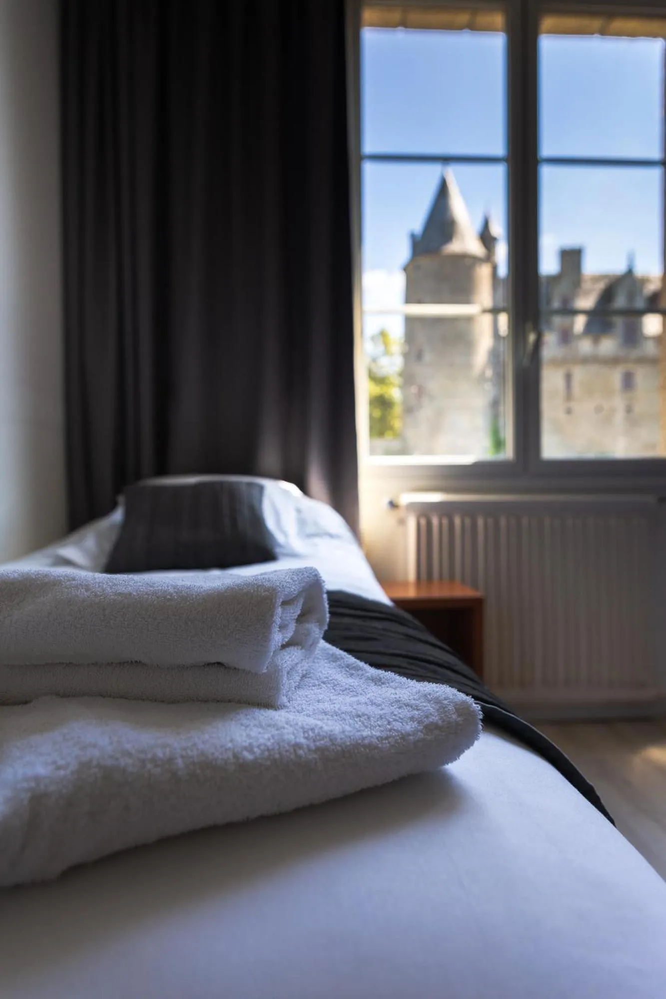 Bedroom in Hôtel Restaurant Du Château