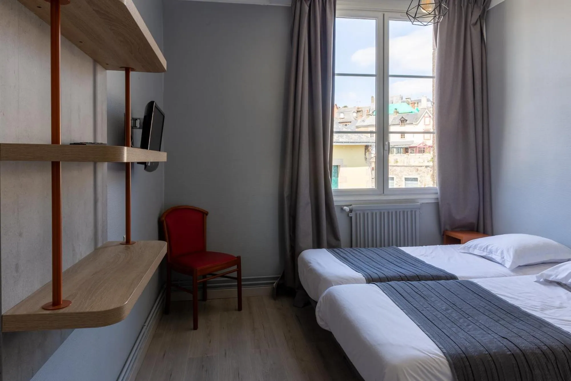 Bedroom in Hôtel Restaurant Du Château