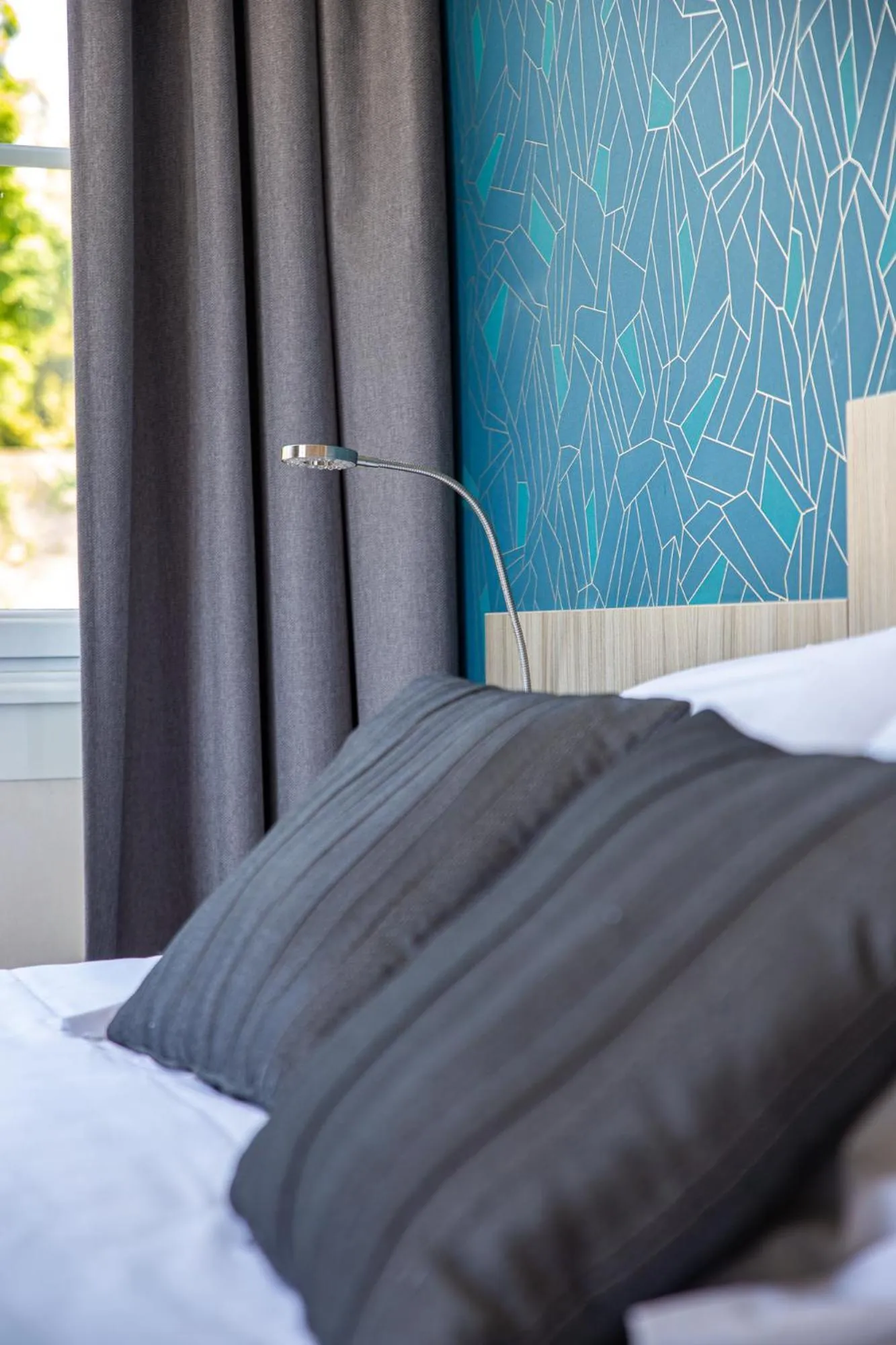 Bedroom in Hôtel Restaurant Du Château