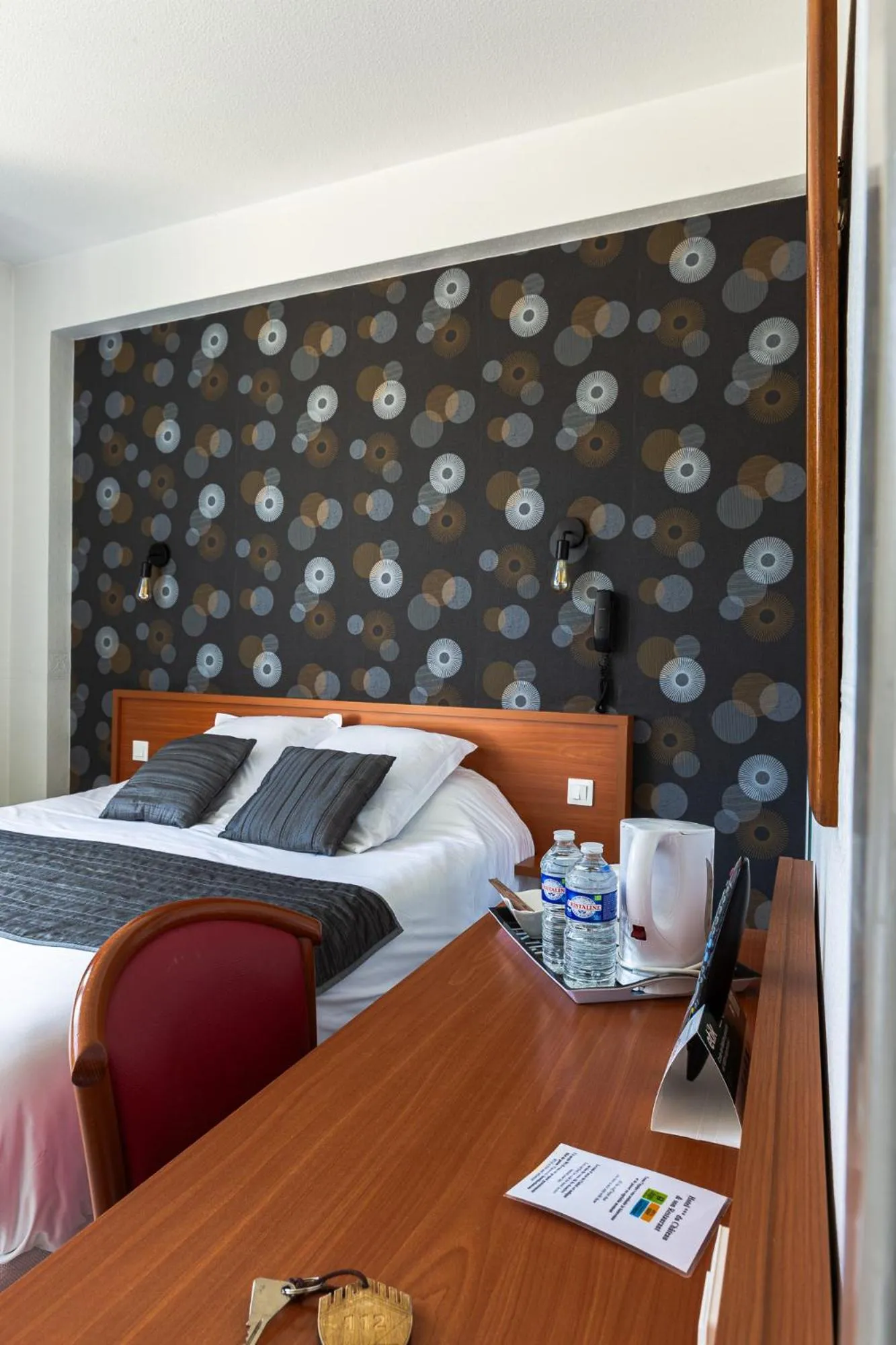 Bedroom in Hôtel Restaurant Du Château