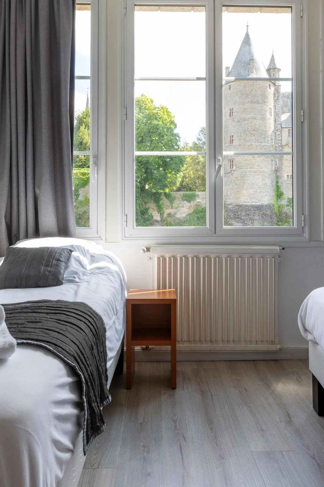 Bedroom in Hôtel Restaurant Du Château