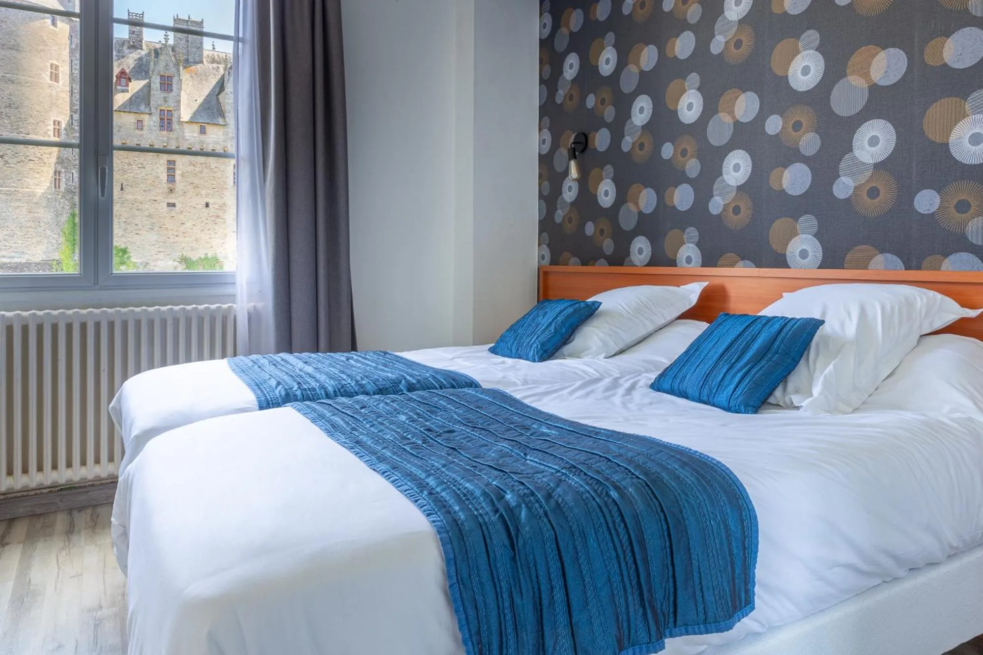 Bedroom in Hôtel Restaurant Du Château