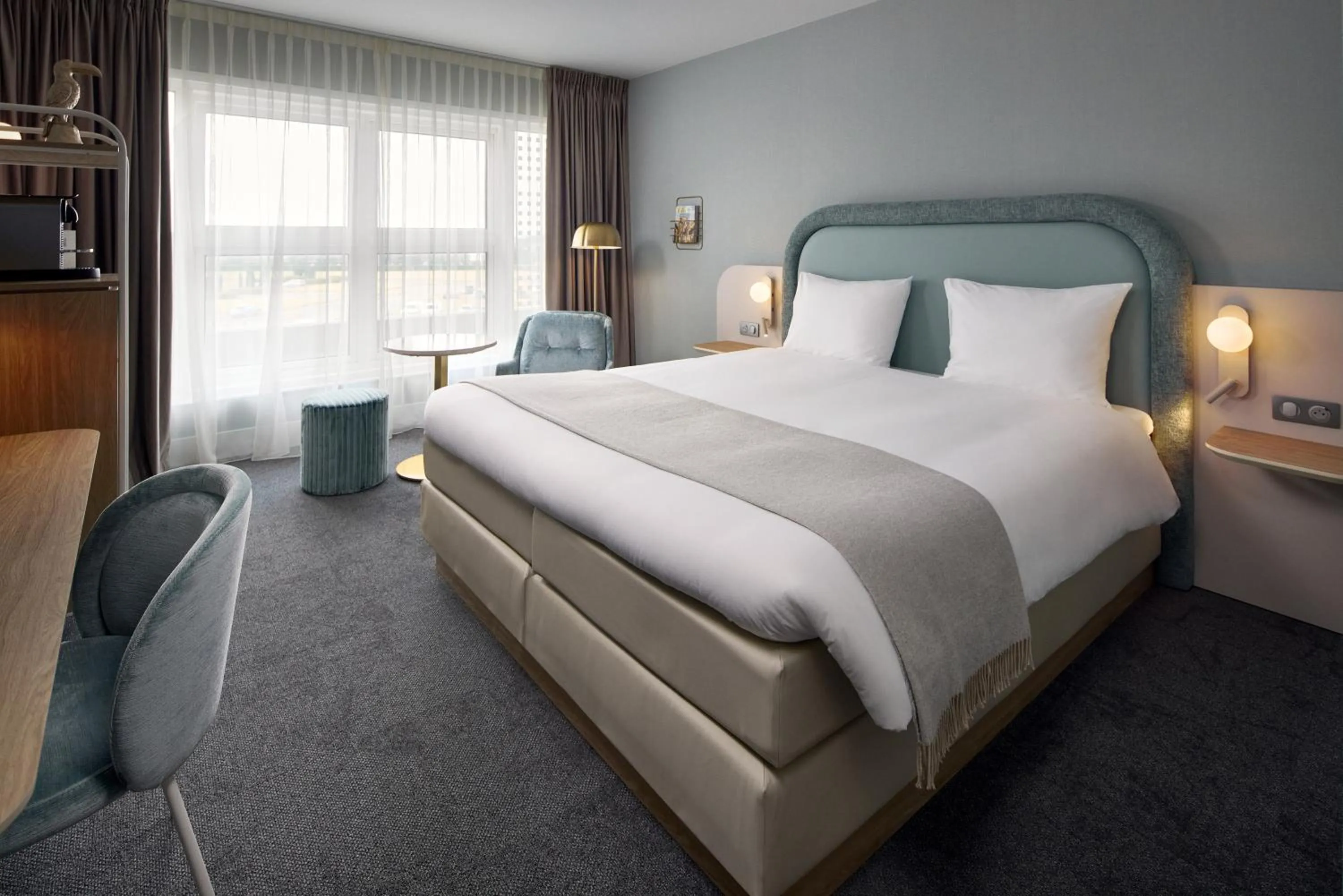 Bed in Van der Valk Hotel Paris CDG Airport