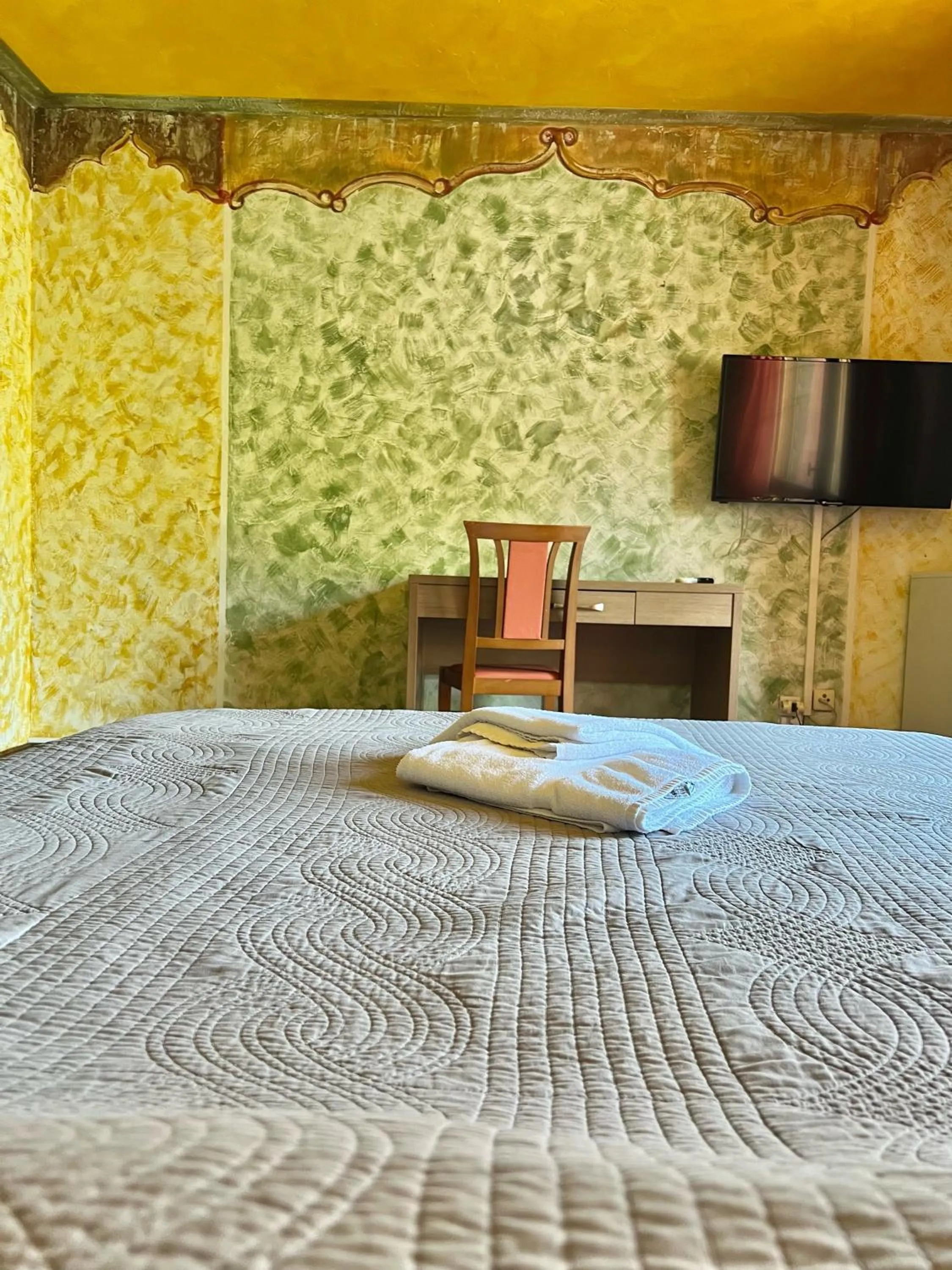 Bed in Hotel De La Gare