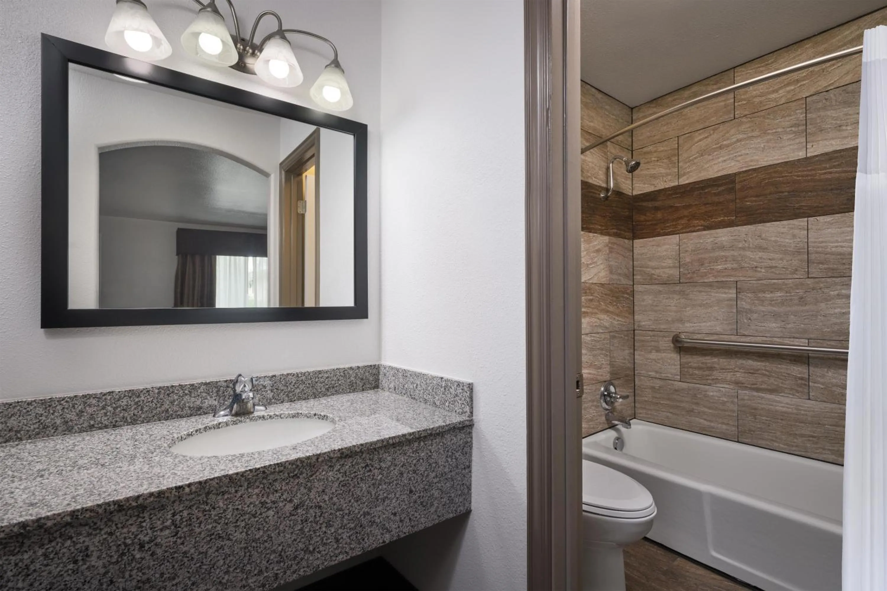 Bathroom in Aiden Austin City Hotel