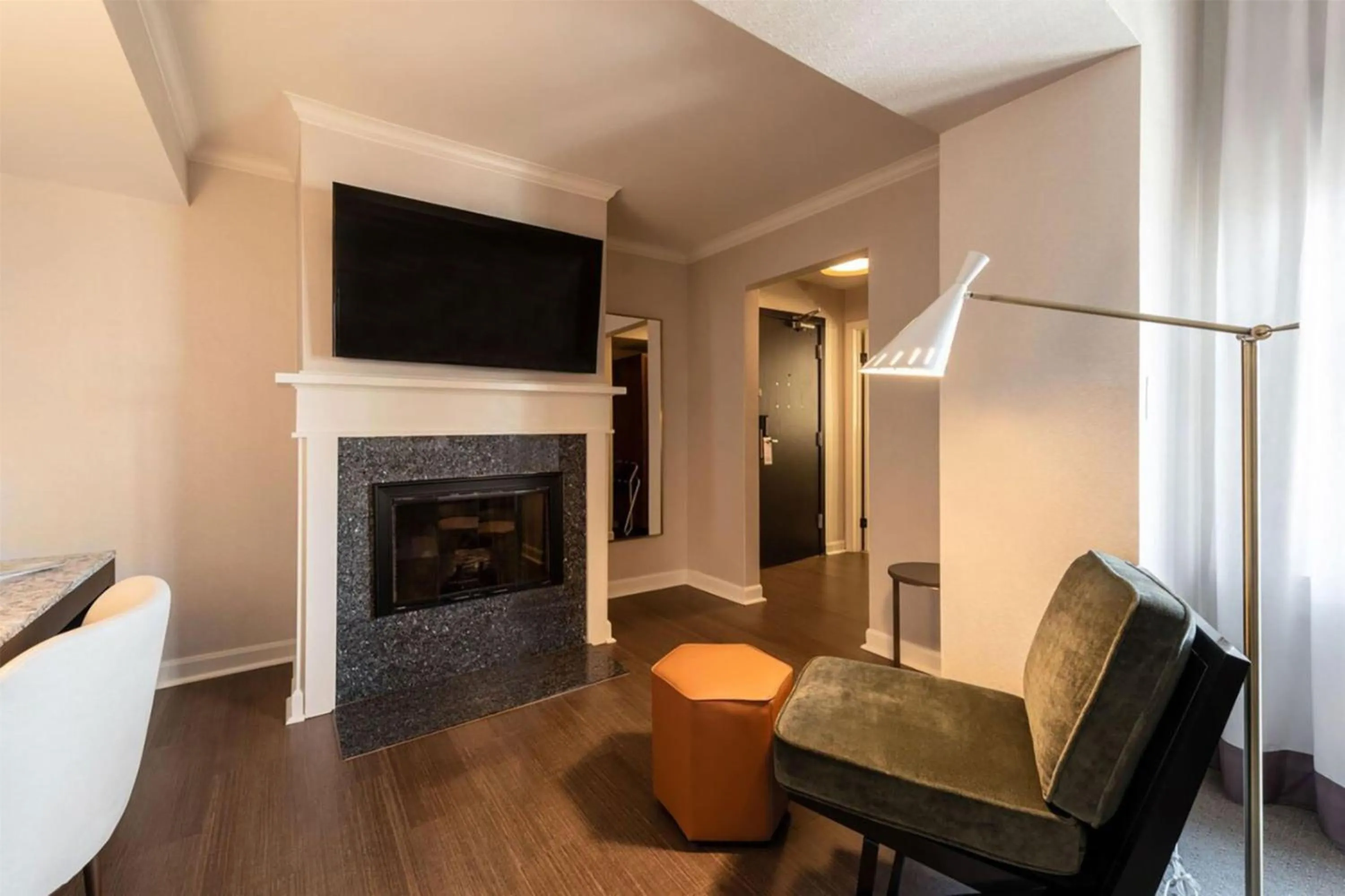 Living room in Claridge House Chicago, Tapestry Collection by Hilton