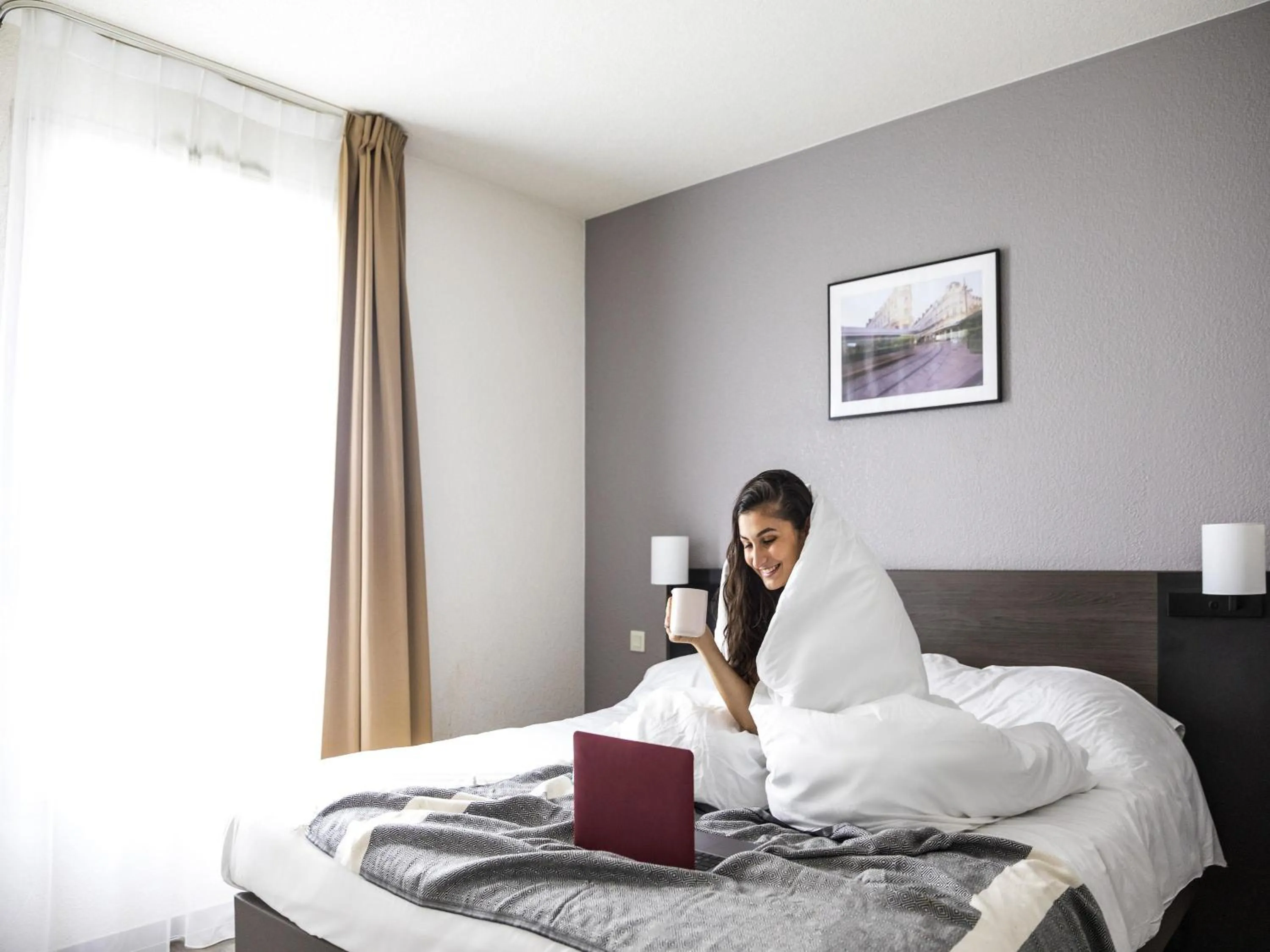 Property building, Bed in Aparthotel Adagio Access Orléans