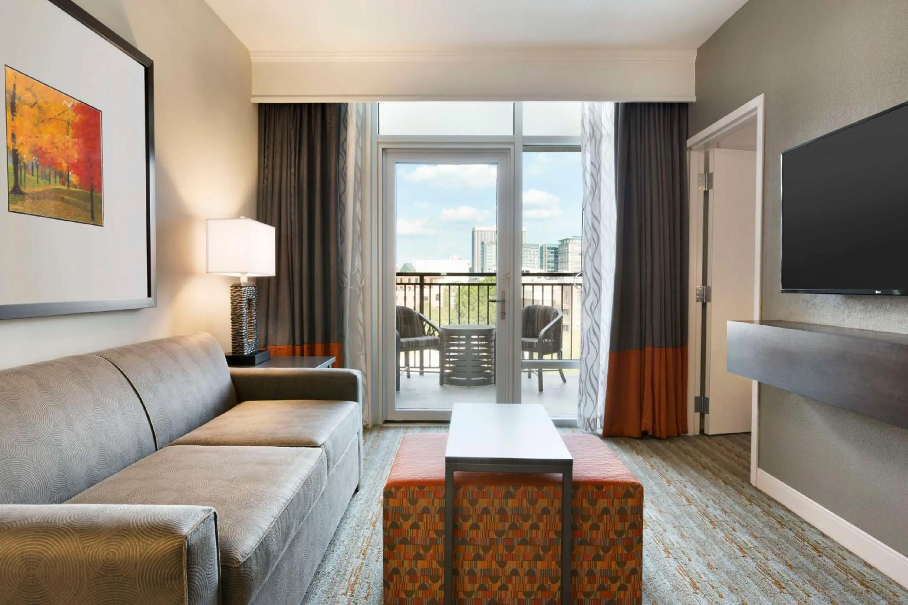 Living room in Embassy Suites by Hilton Greenville Downtown Riverplace