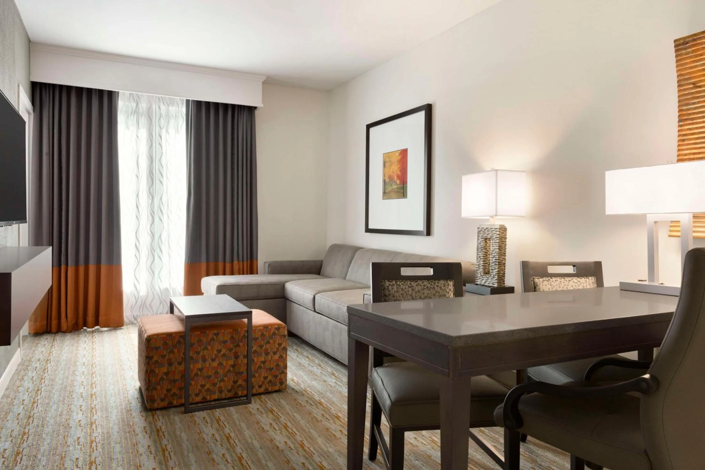 Living room in Embassy Suites by Hilton Greenville Downtown Riverplace