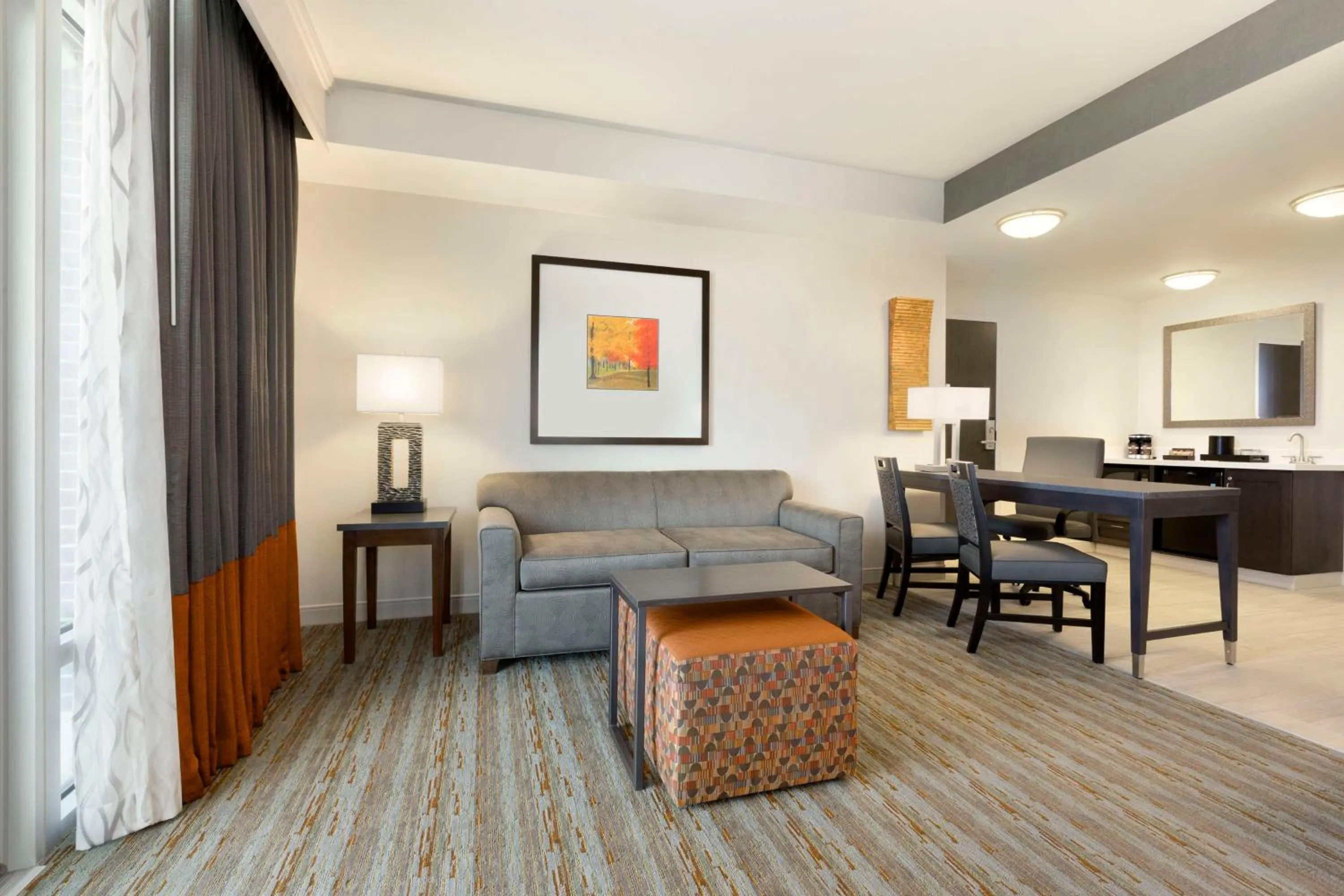 Living room in Embassy Suites by Hilton Greenville Downtown Riverplace