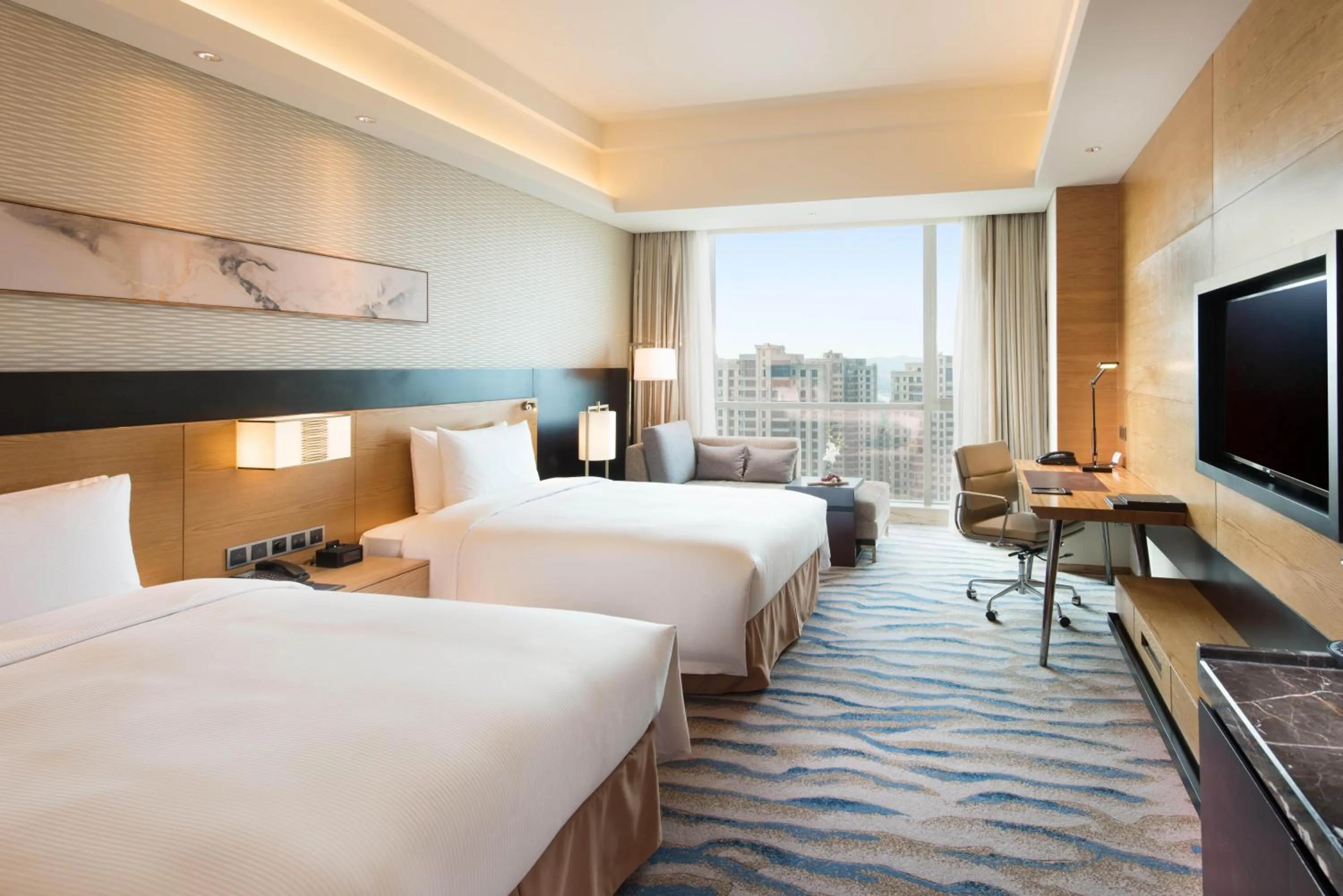 Property building, Bed in Hilton Yantai Golden Coast