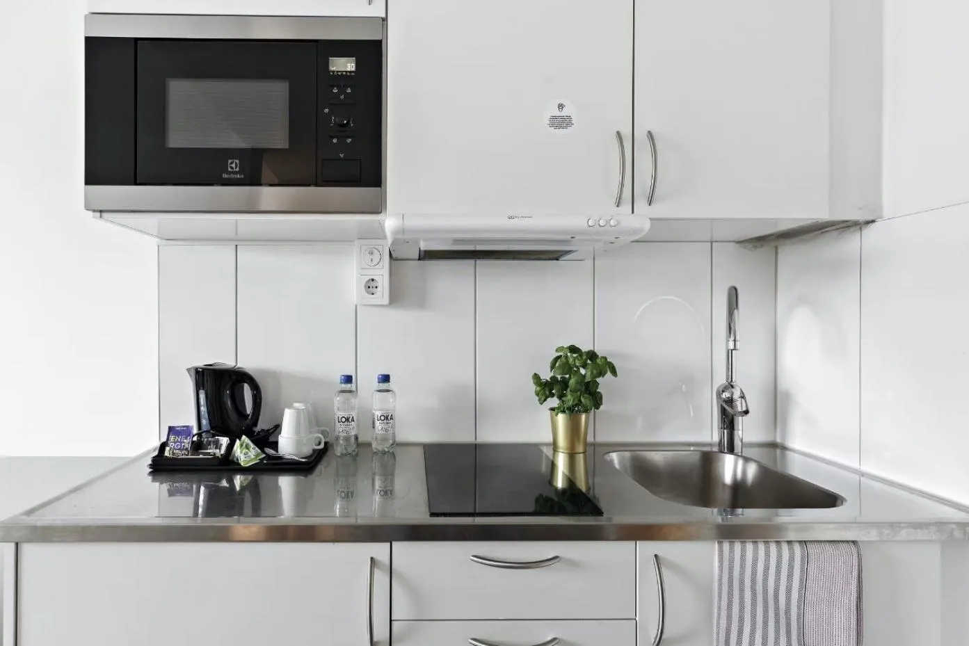 Kitchen or kitchenette in Forenom Hotels & Apartments Stockholm Alvik