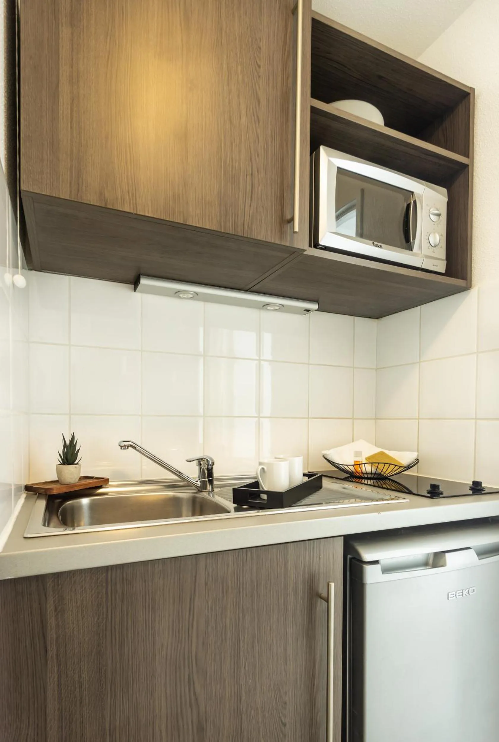 Kitchen or kitchenette in City Résidence Tours