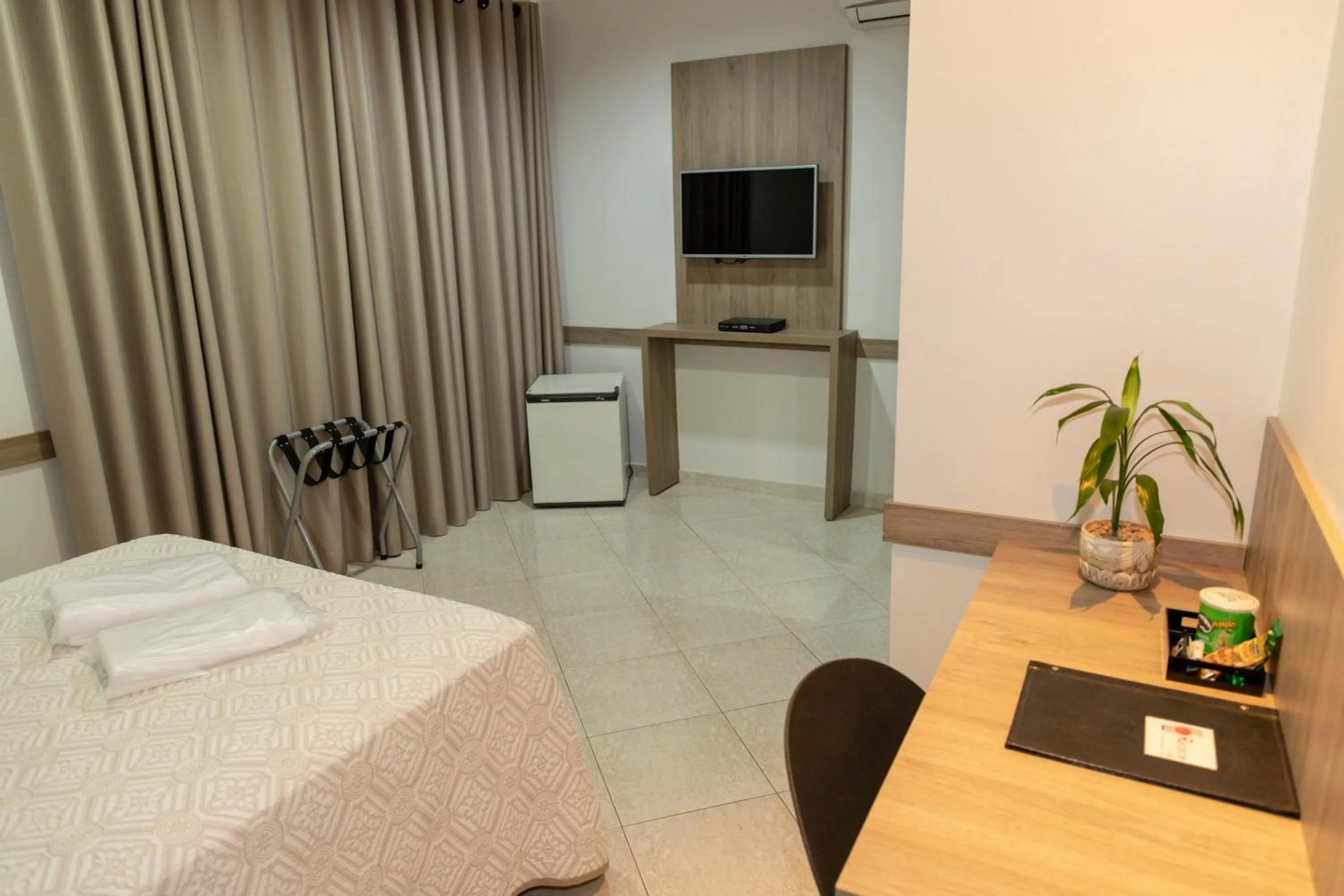 Bedroom in Realce Hotel