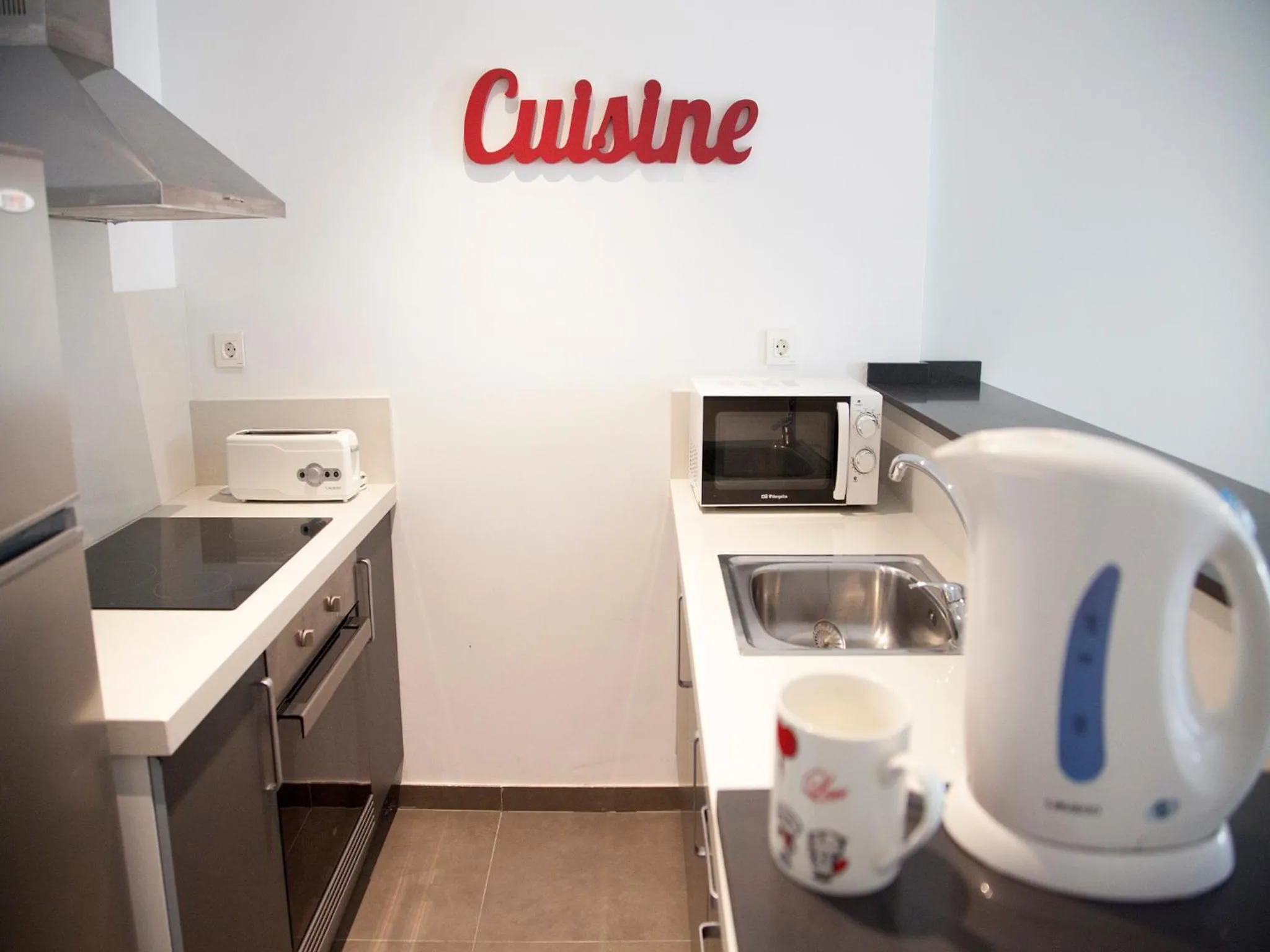 Kitchen or kitchenette in Flats Friends Soho Suites