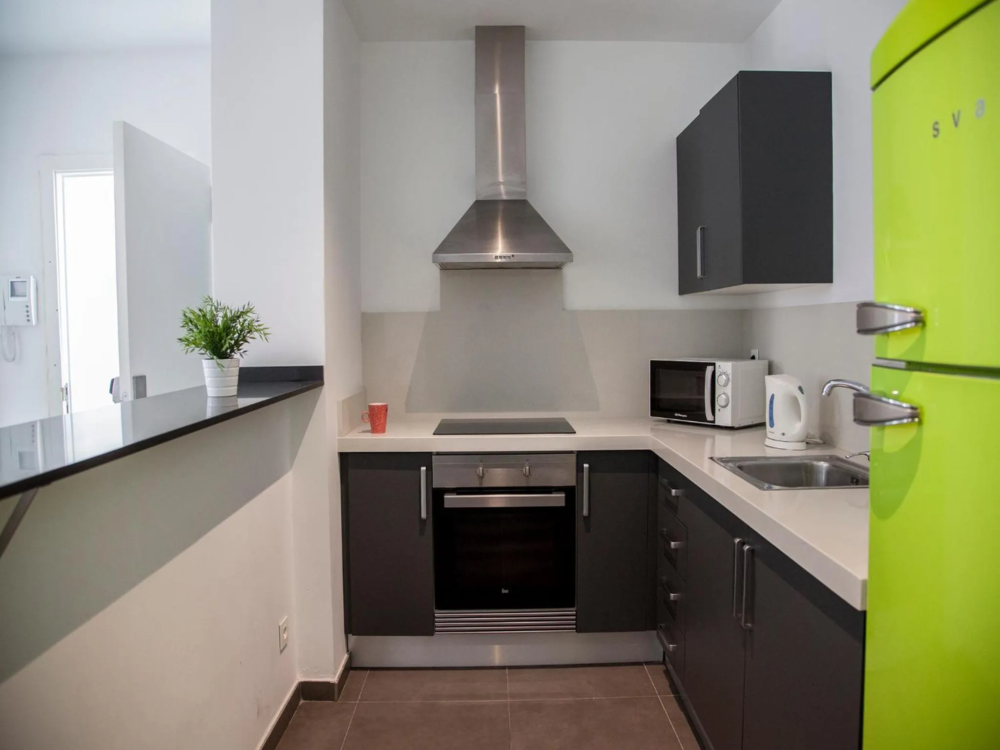 Kitchen or kitchenette in Flats Friends Soho Suites