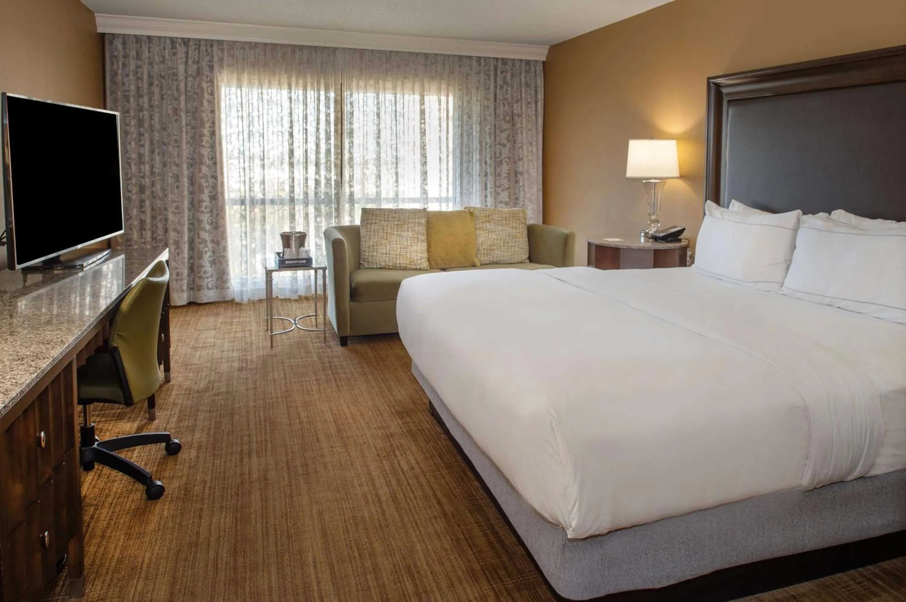 Bed in Hilton St. Louis Airport