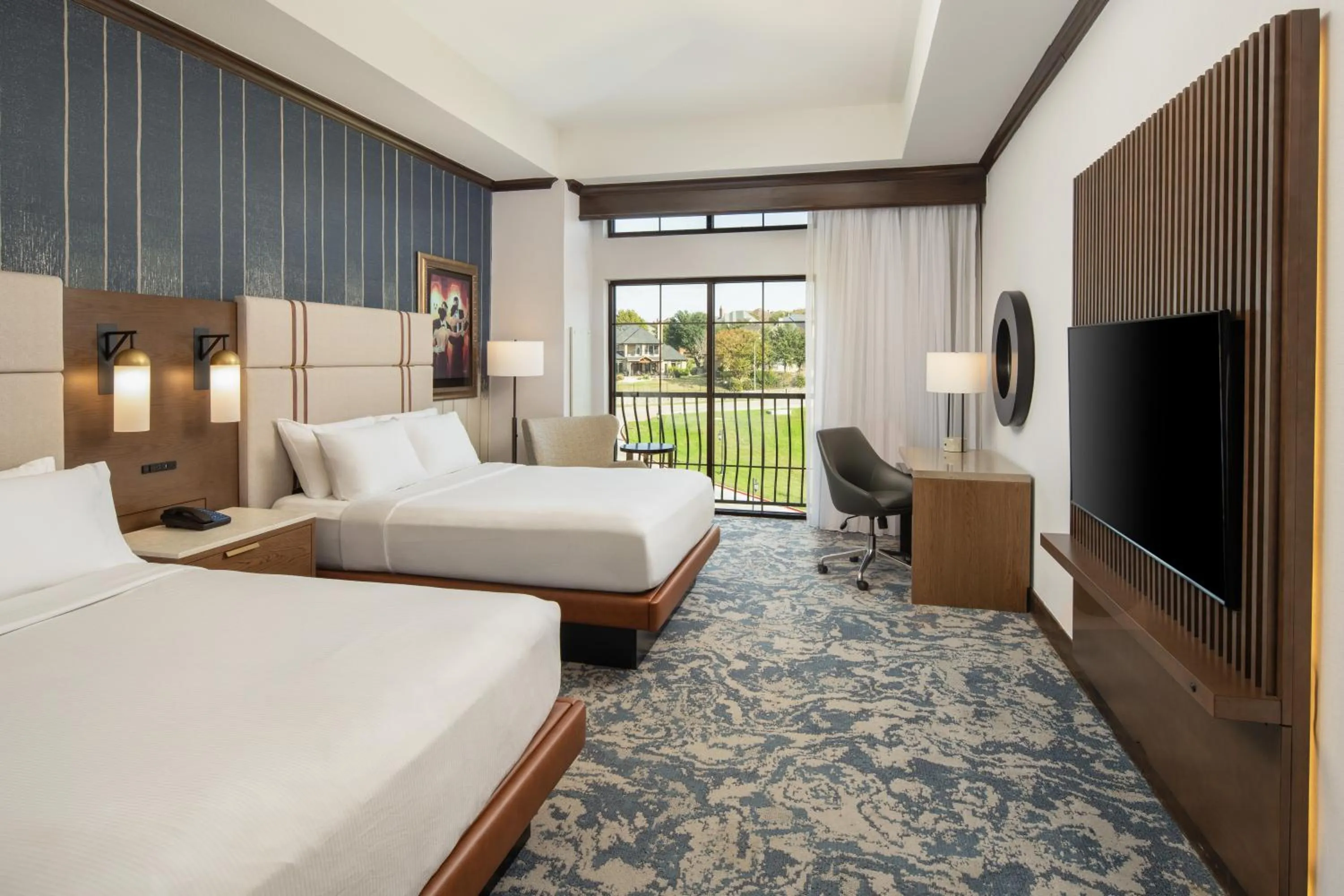 Bed in Hilton Dallas/Rockwall Lakefront Hotel