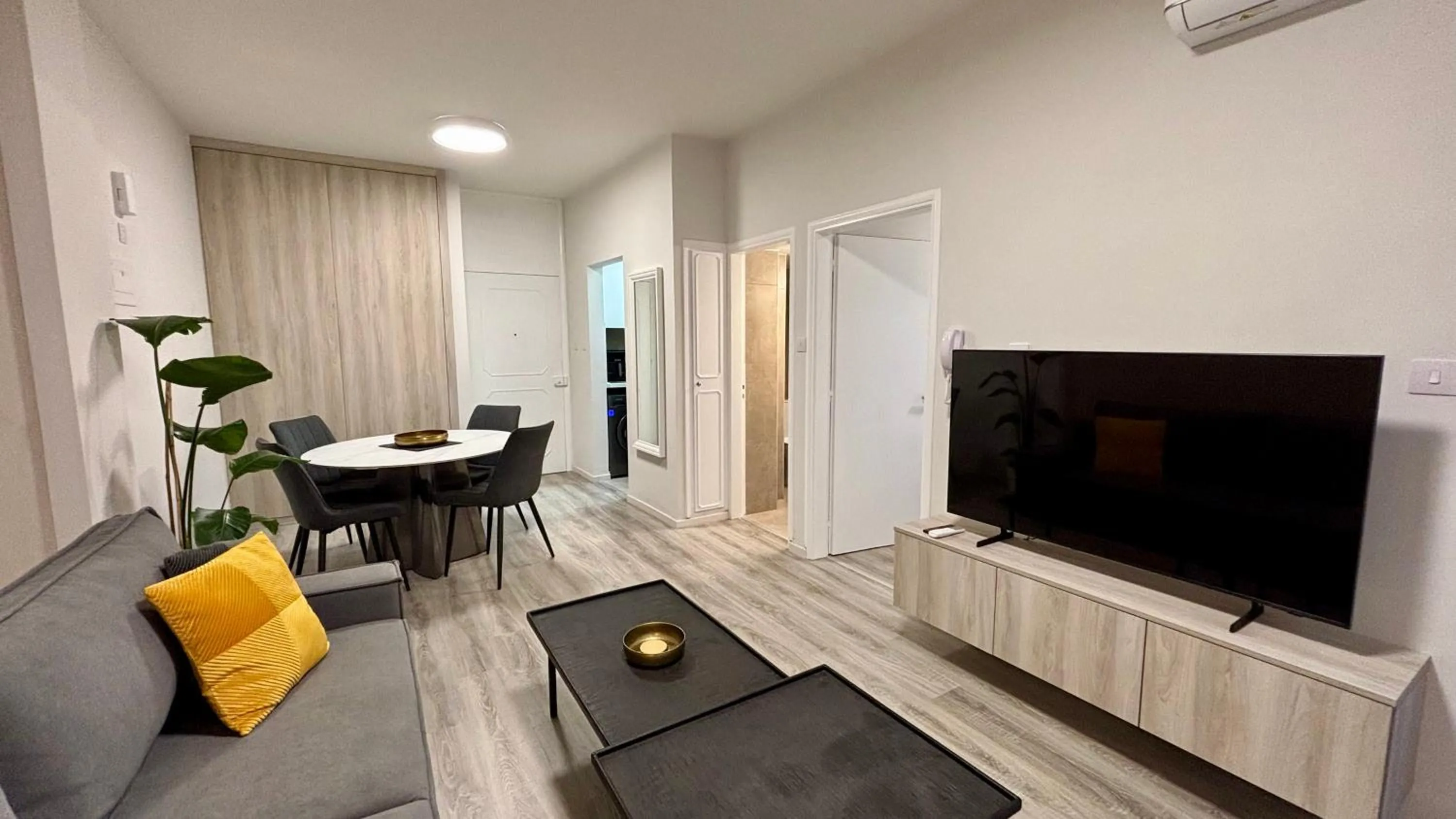 Living room in SeaBreeze City Center Flats by TrulyCyprus