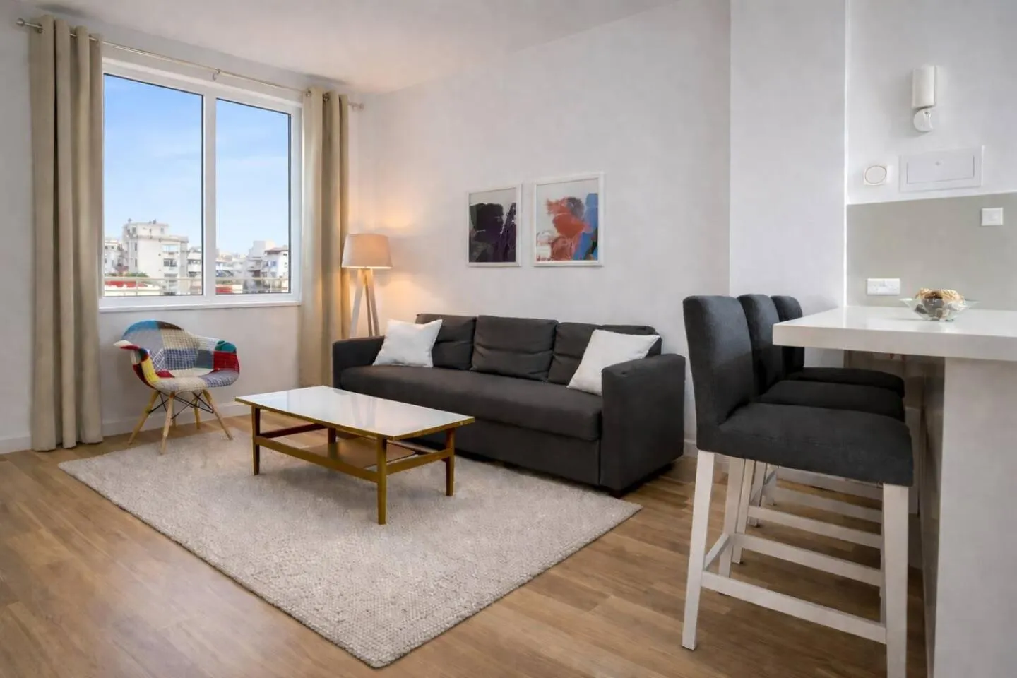 Living room in SeaBreeze City Center Flats by TrulyCyprus