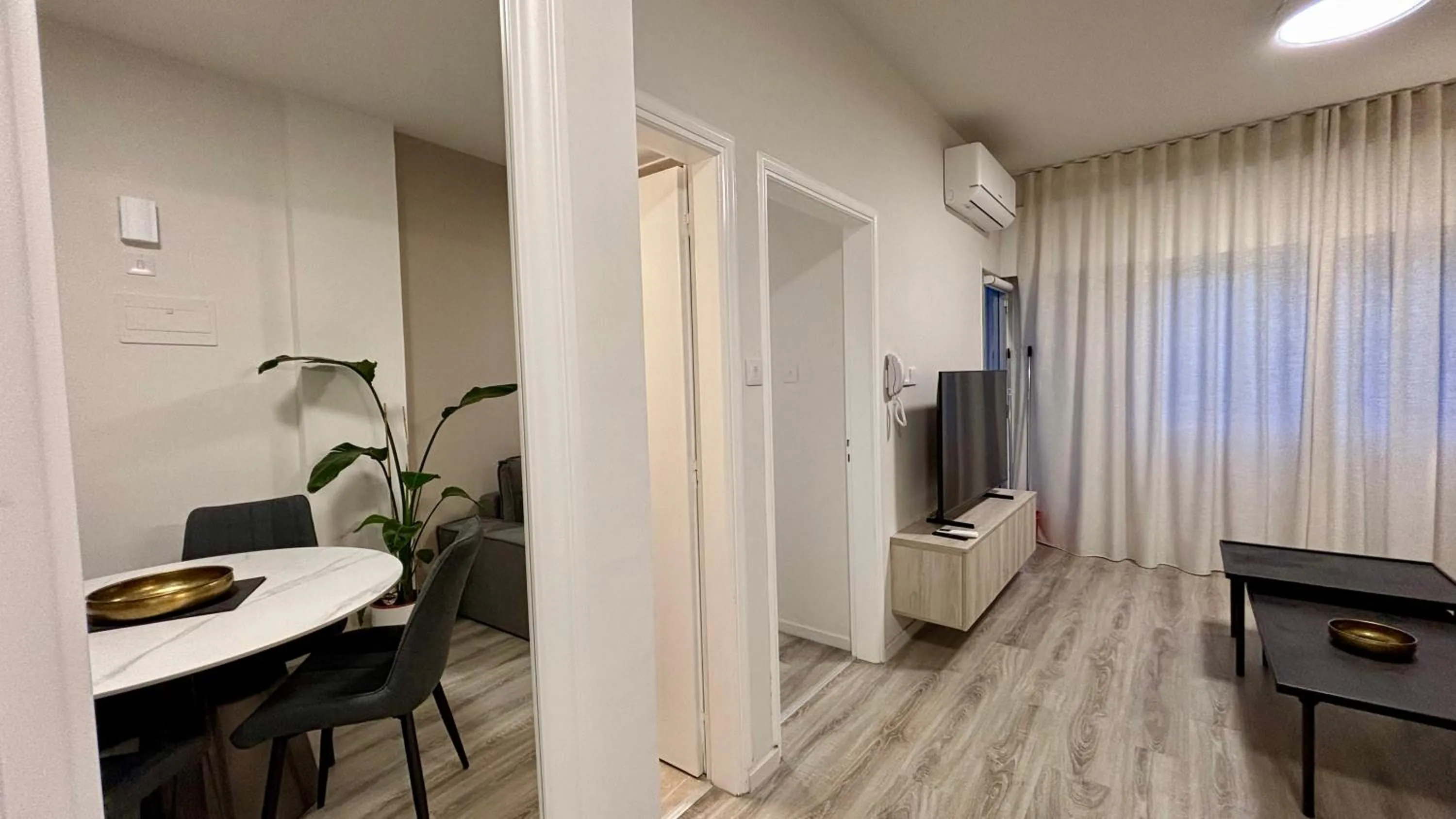 Living room in SeaBreeze City Center Flats by TrulyCyprus