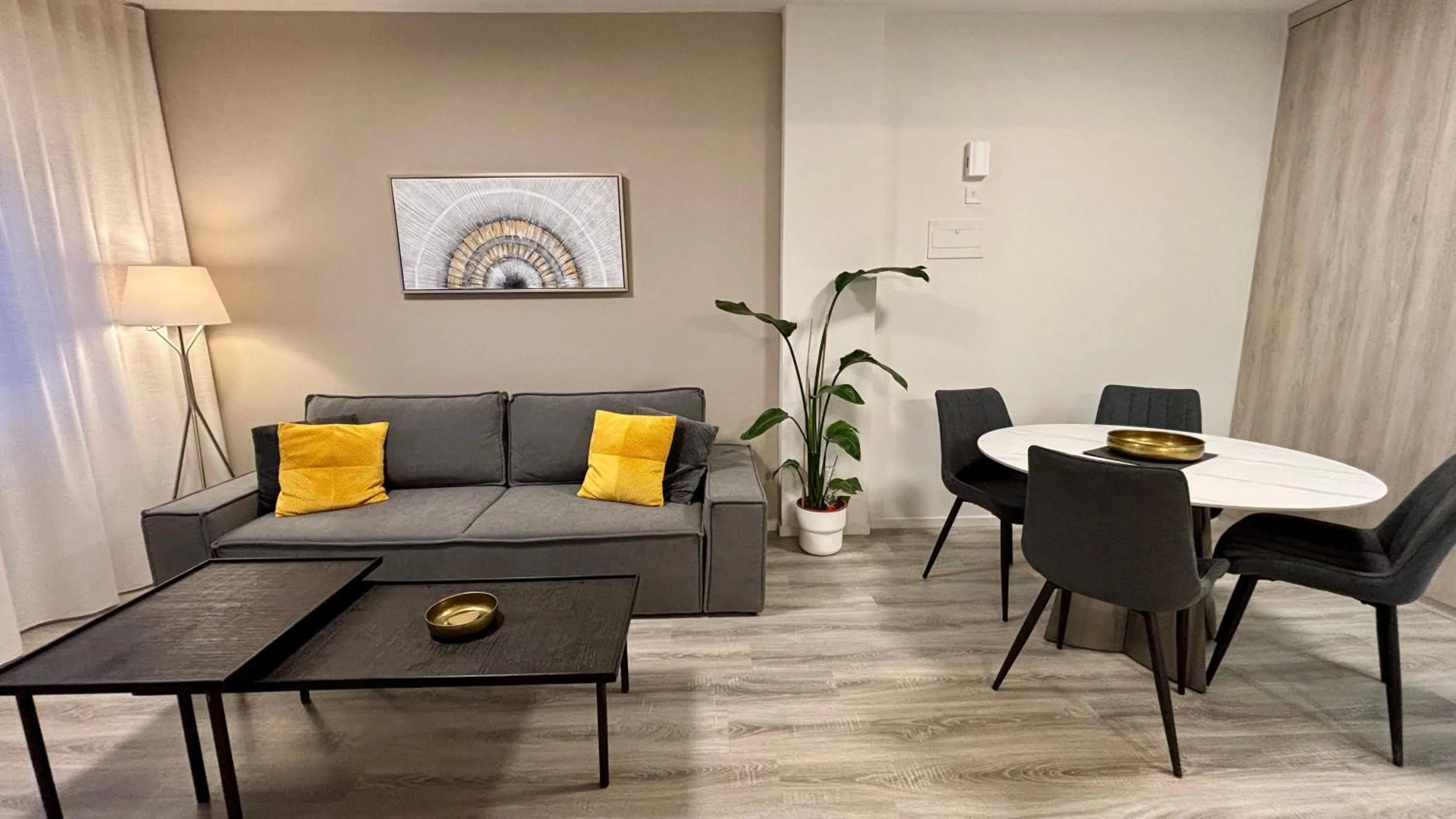 Living room in SeaBreeze City Center Flats by TrulyCyprus