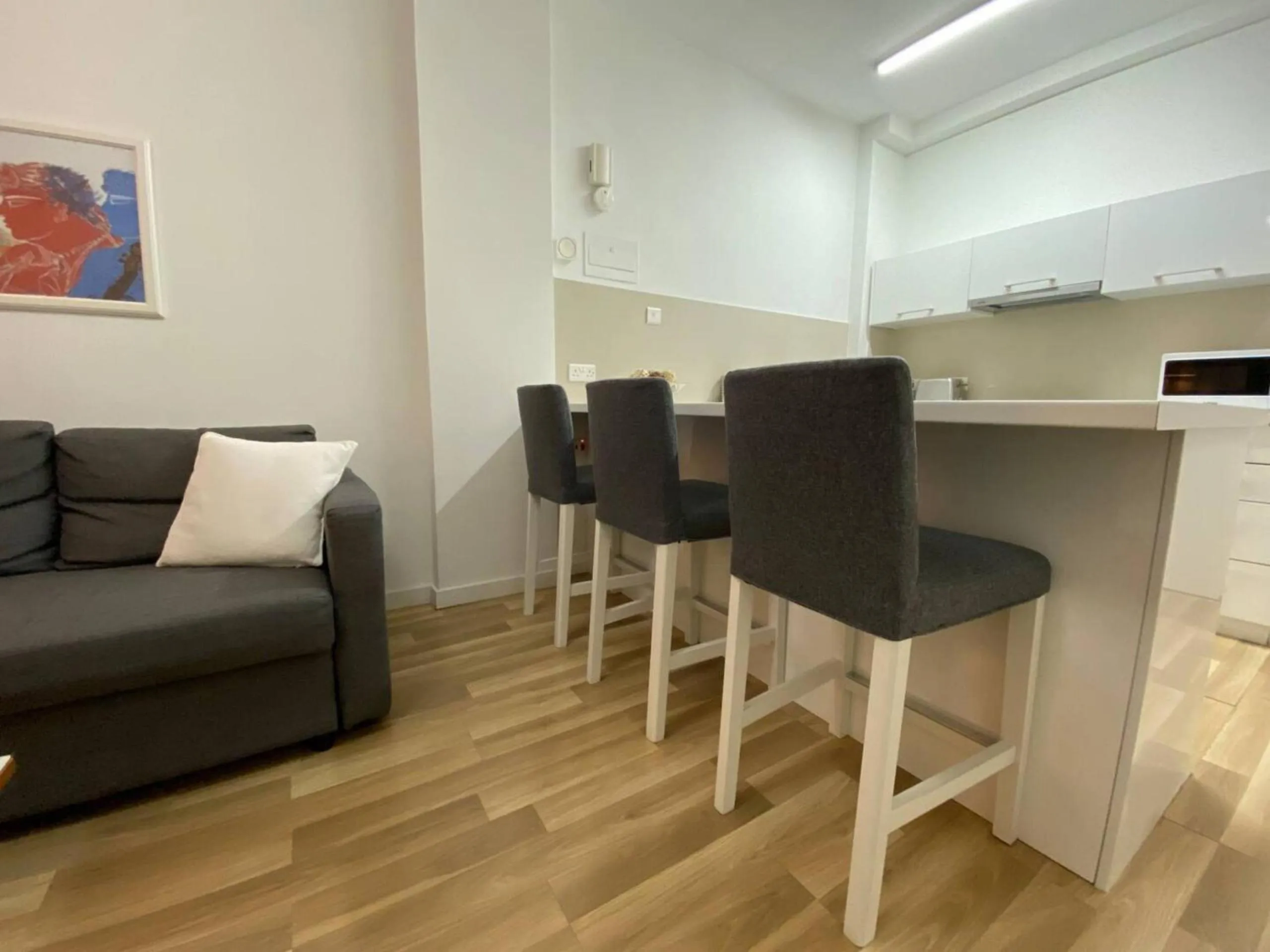 Dining area in SeaBreeze City Center Flats by TrulyCyprus