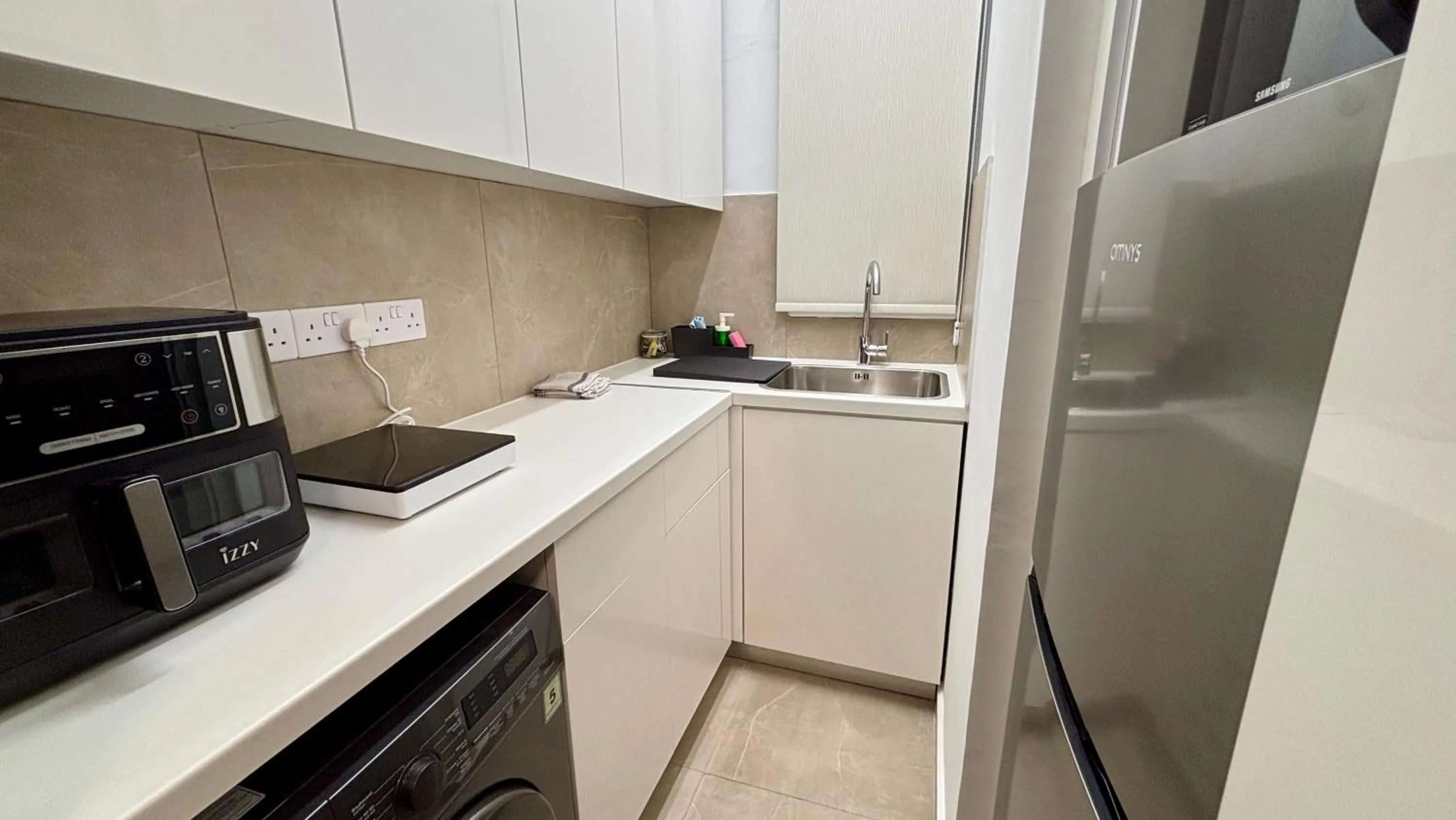 Kitchen or kitchenette in SeaBreeze City Center Flats by TrulyCyprus