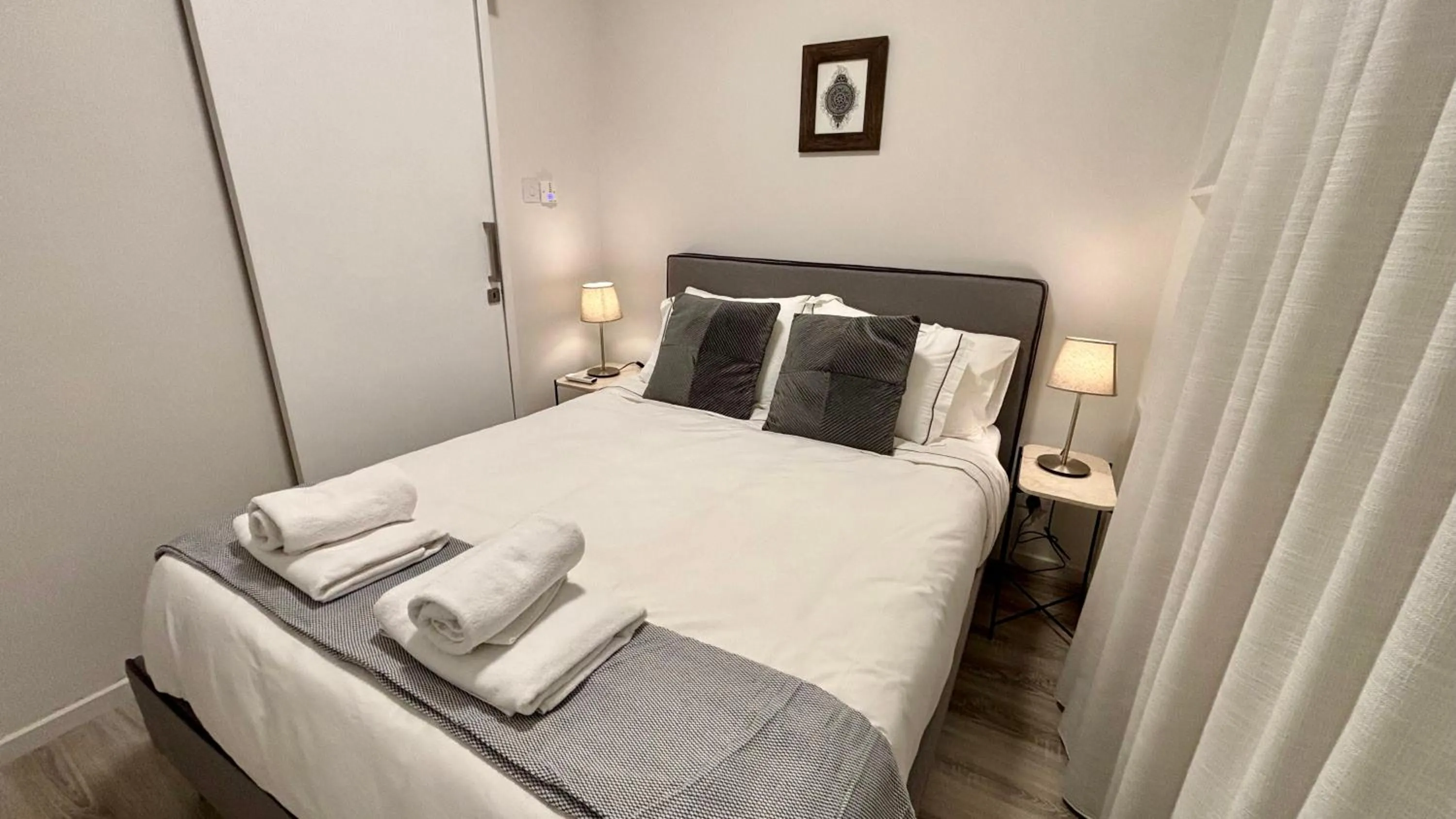 Bedroom, Bed in SeaBreeze City Center Flats by TrulyCyprus