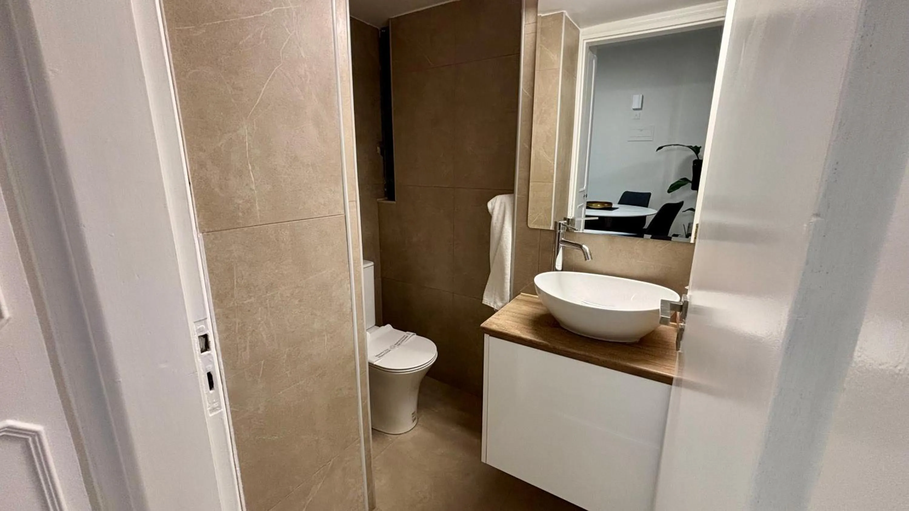 Toilet in SeaBreeze City Center Flats by TrulyCyprus