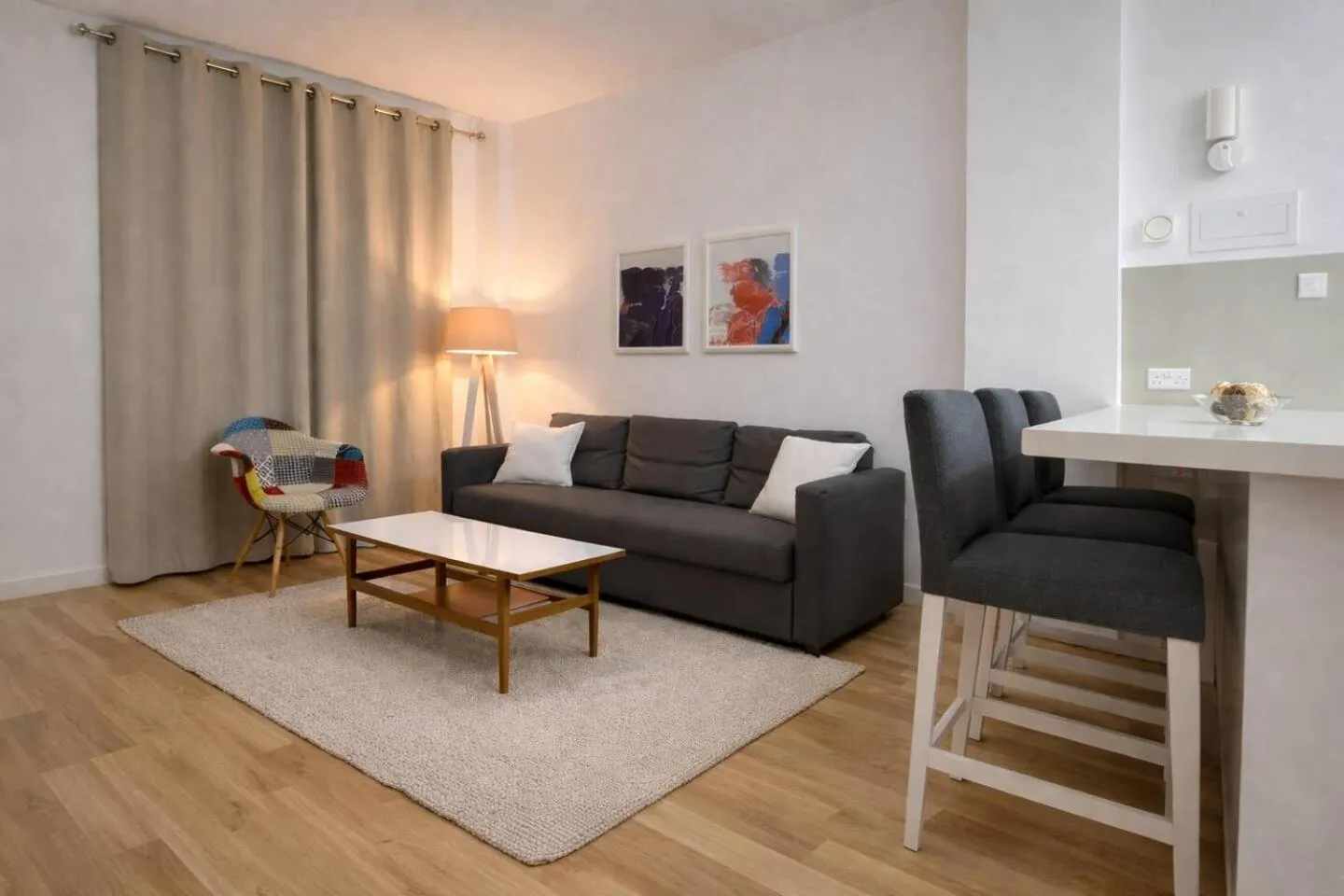 Living room in SeaBreeze City Center Flats by TrulyCyprus