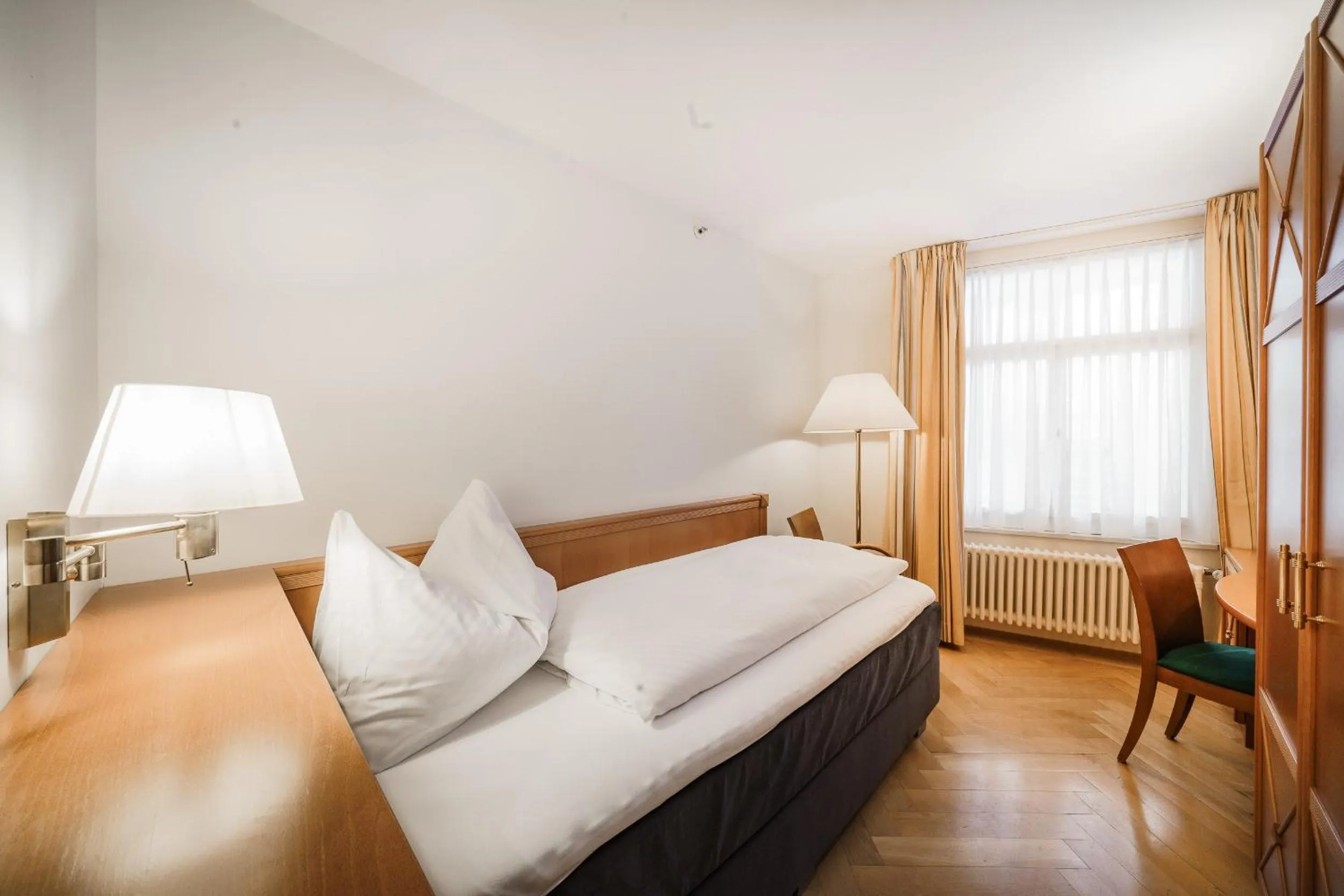 Bed in BLUME Baden Hotel & Restaurant