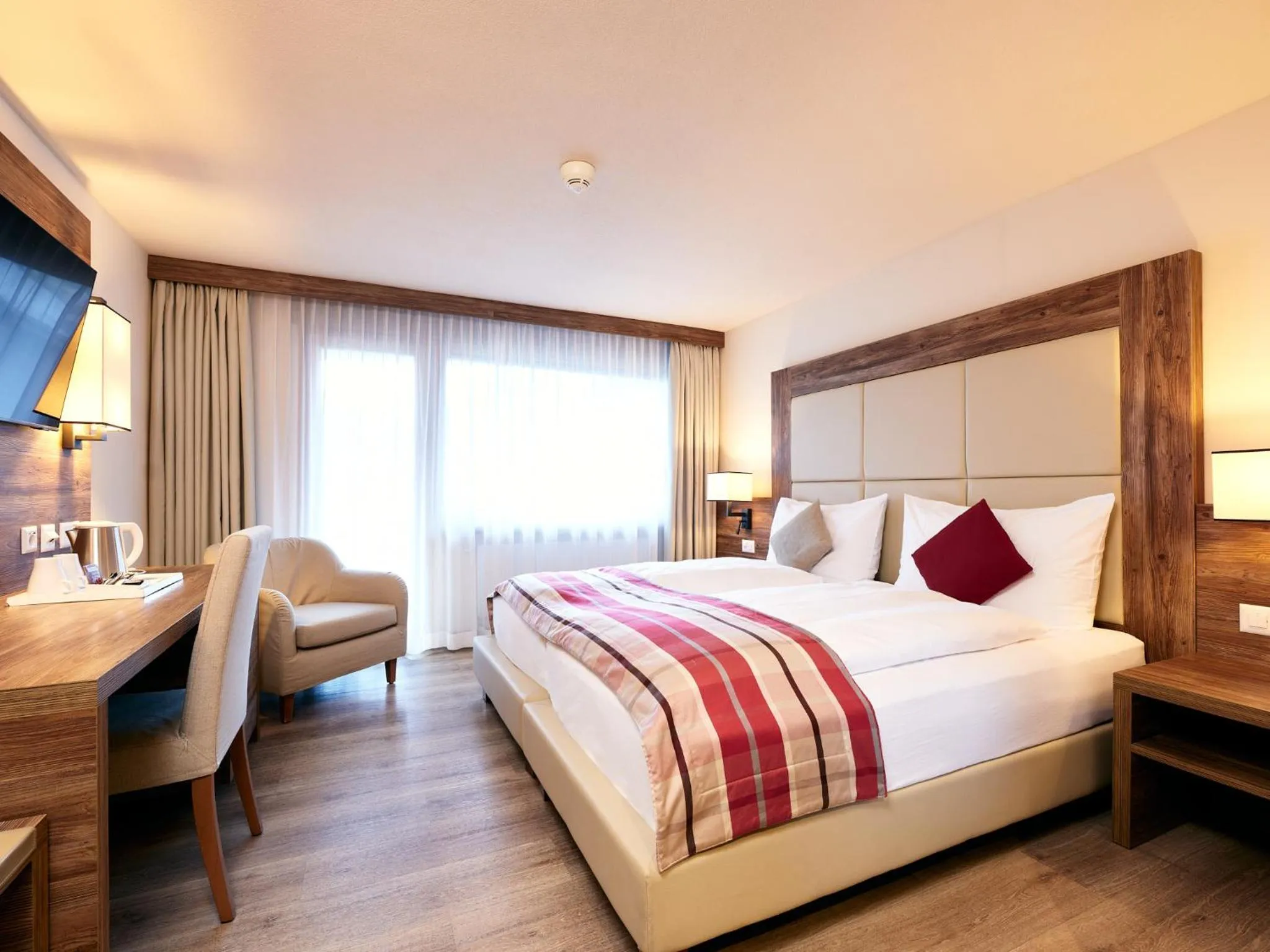 Bedroom, Bed in Hotel Ambassador Zermatt