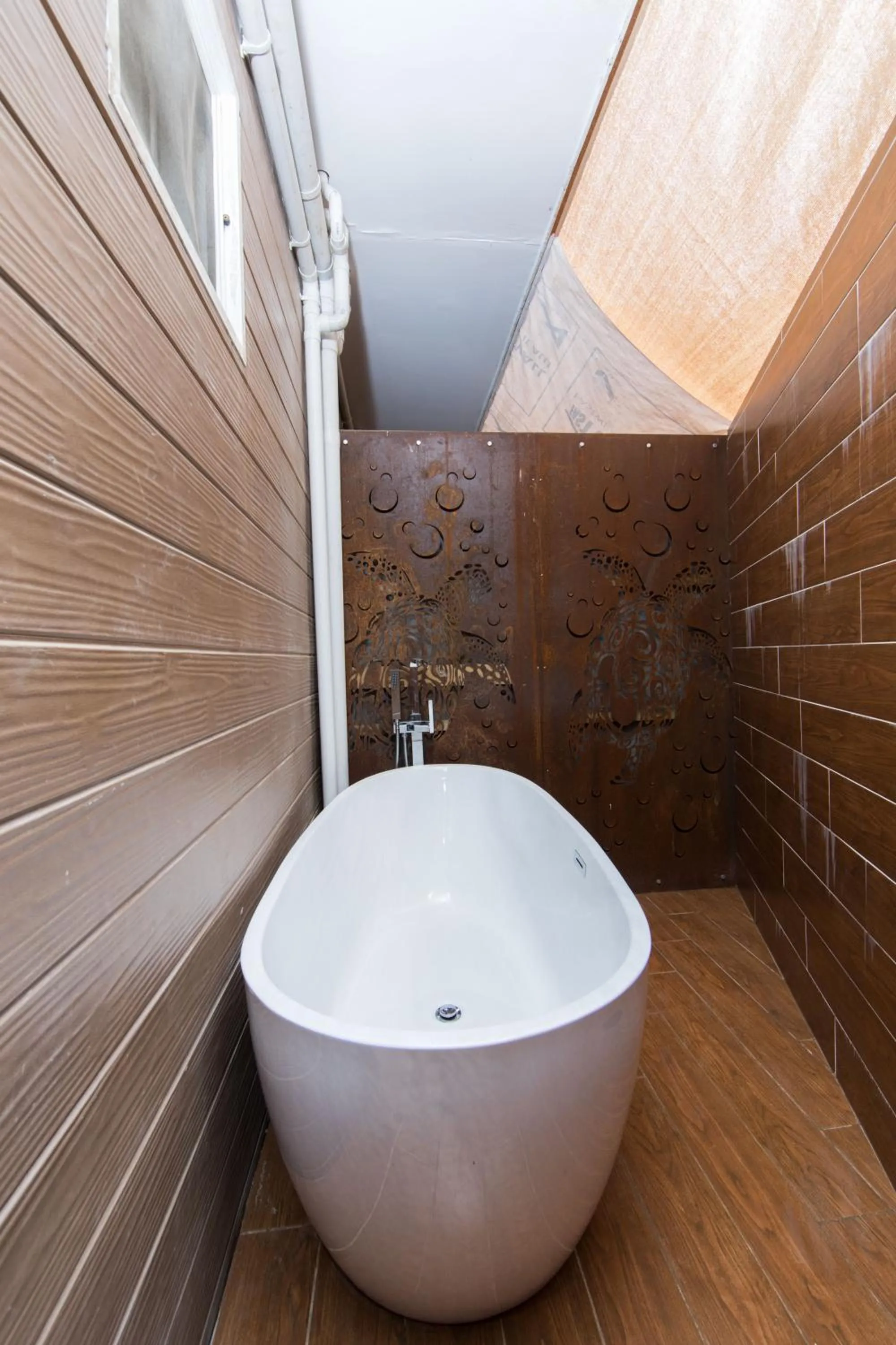 Bathroom in Kia Orana Villas and Spa