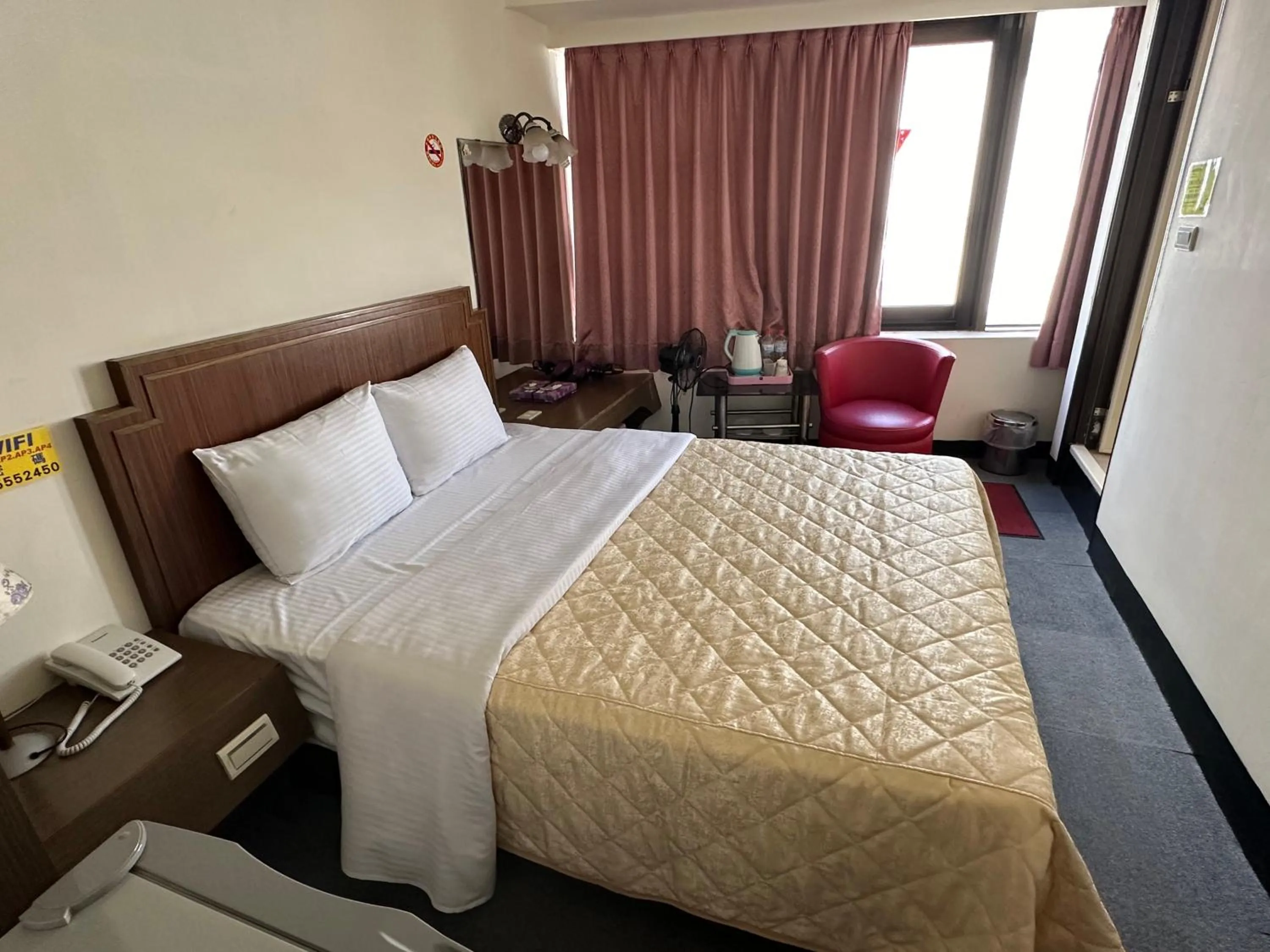 Bed in Chian Huei Business Hotel