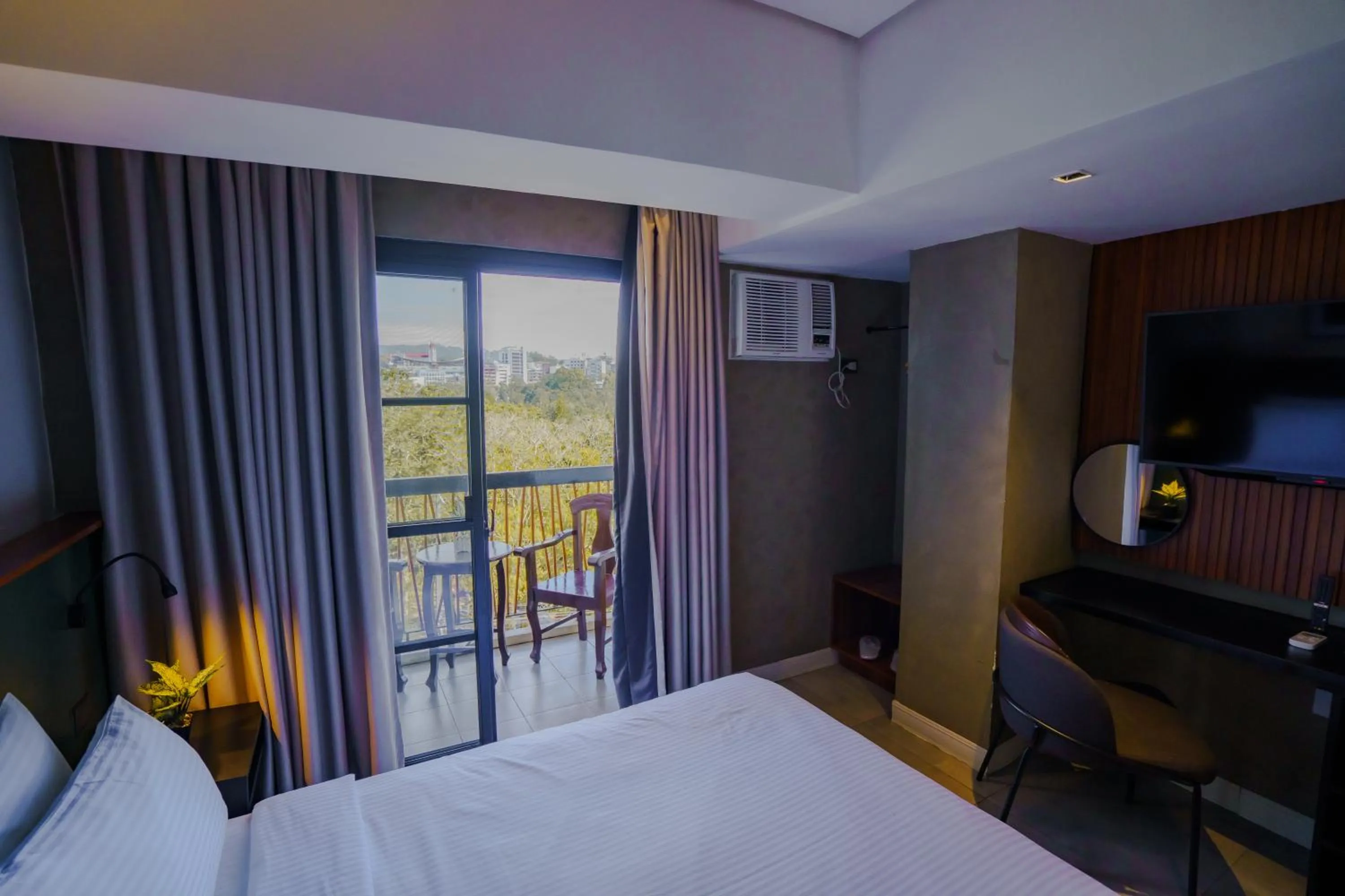 Bed in Venus Parkview Hotel