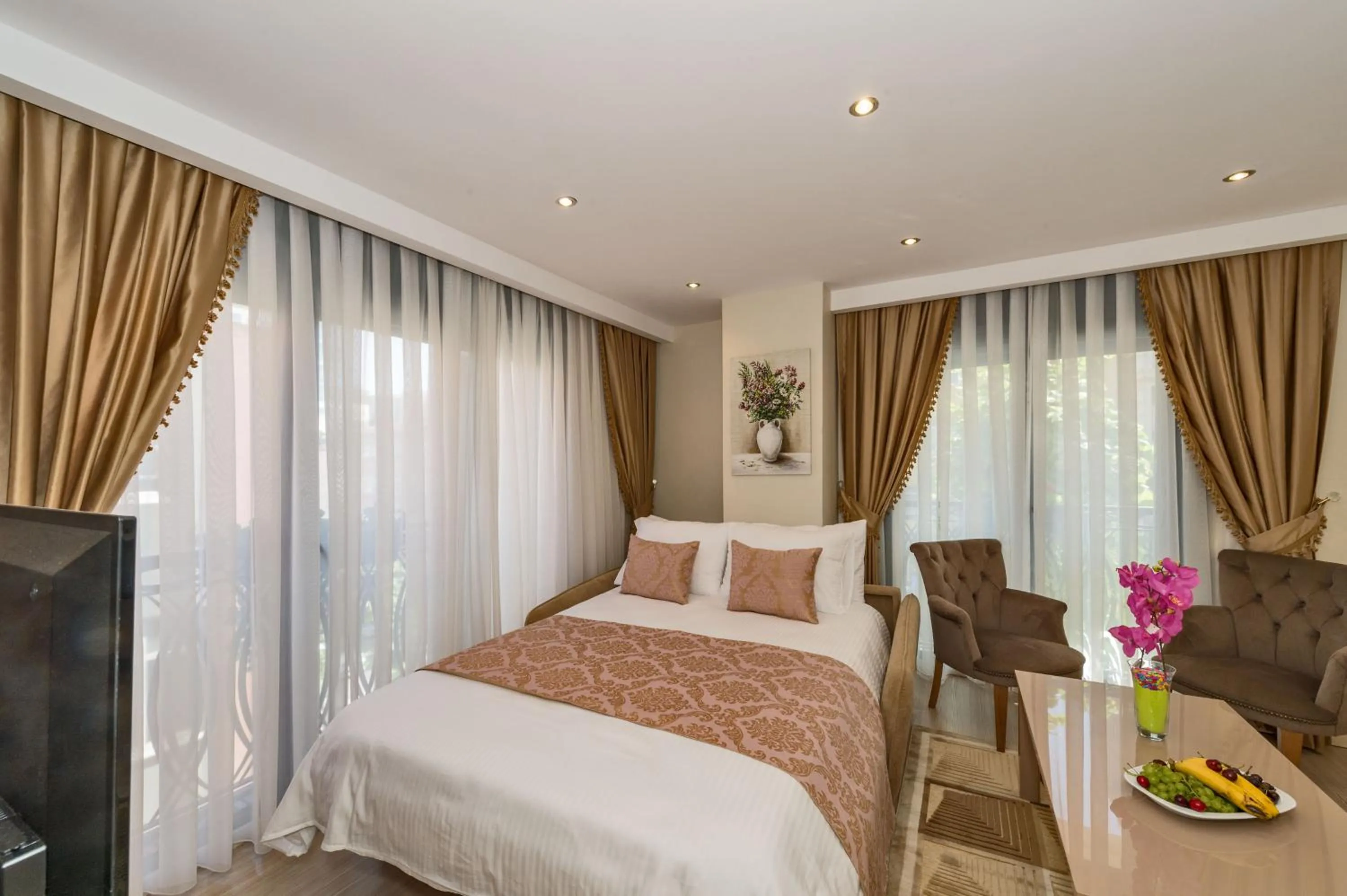 Photo of the whole room, Bed in Gen Suites