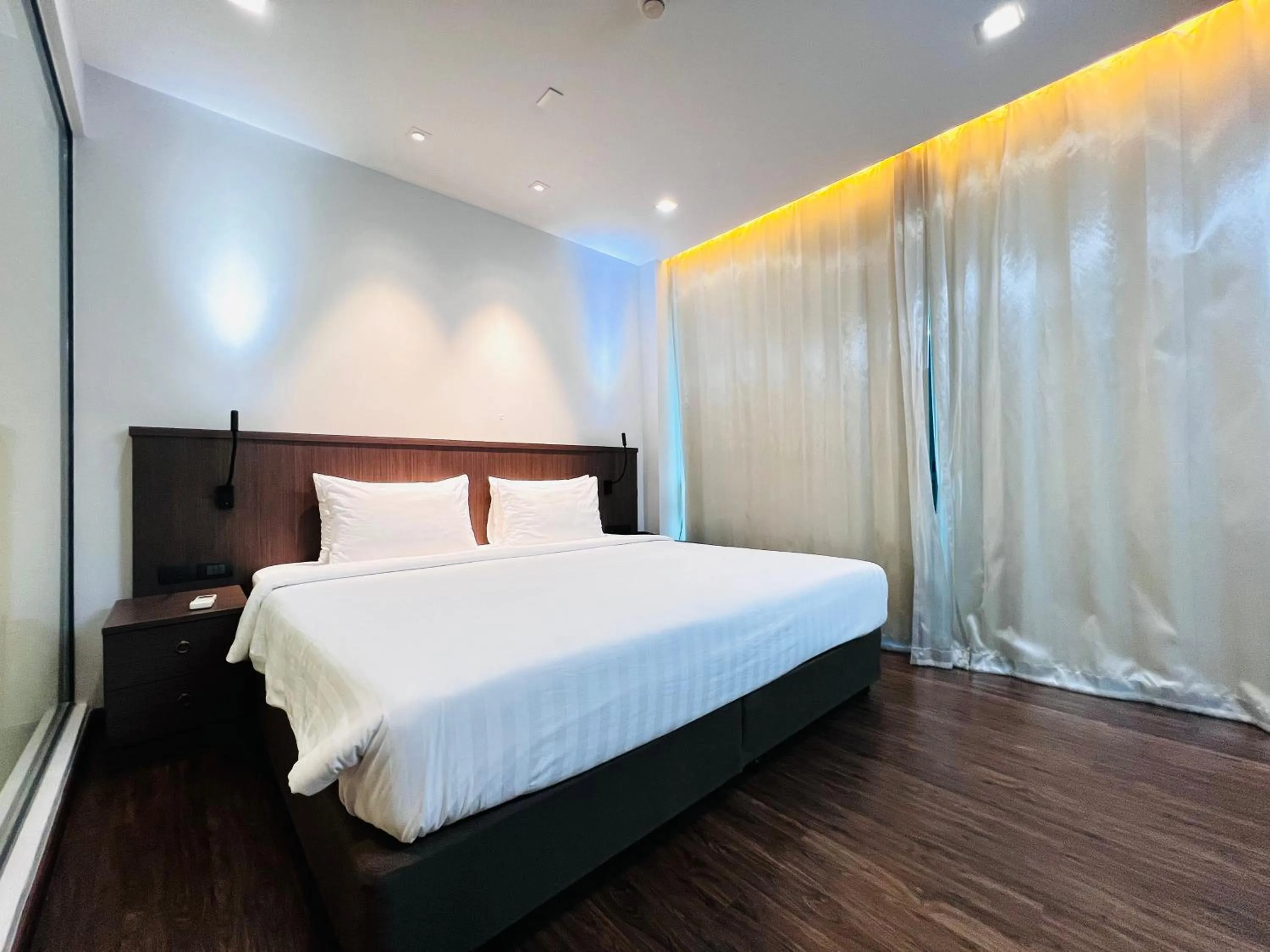 Bed in Civic Horizon Hotel & Residence