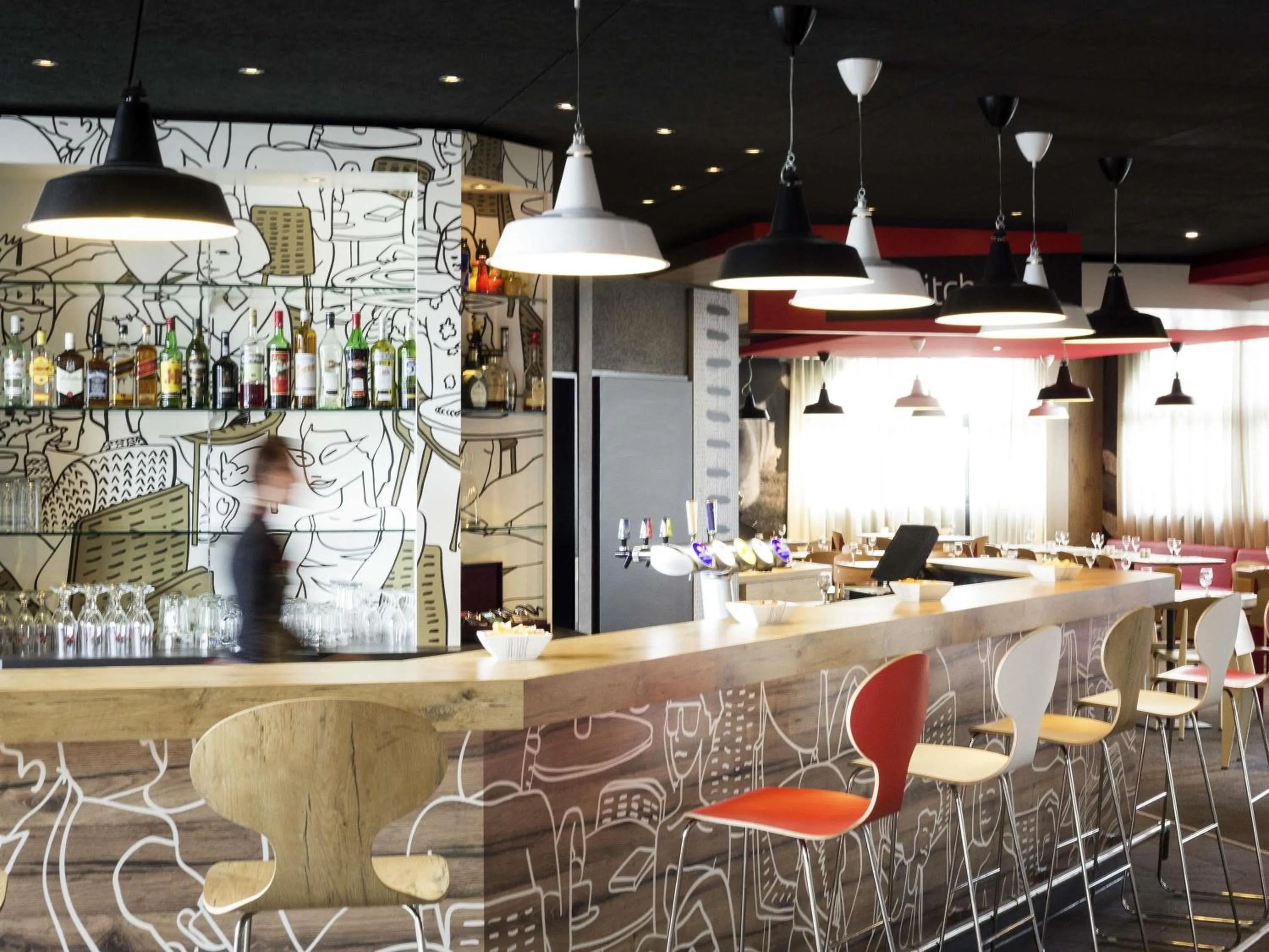 Lounge or bar in ibis Lausanne Crissier