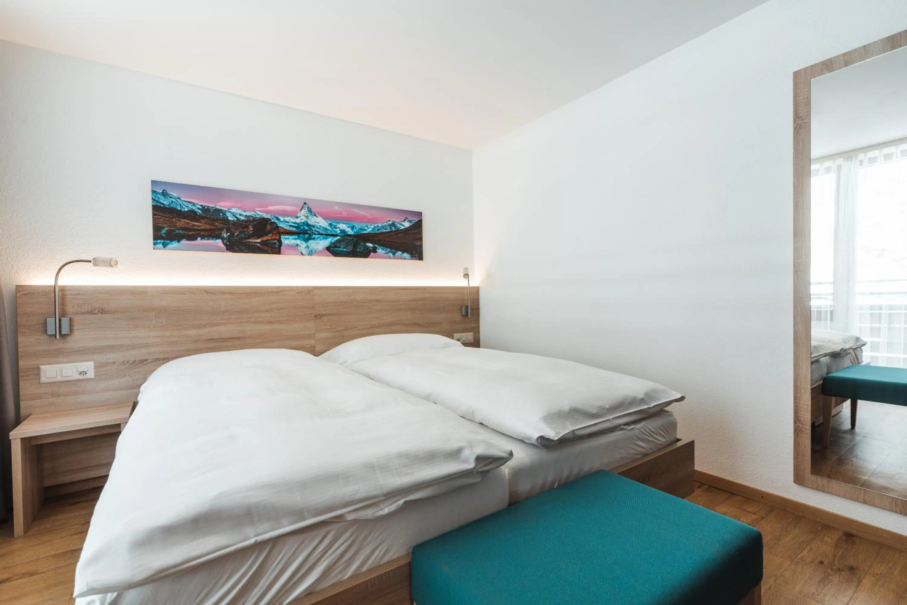 Bed in Hotel Matterhorn Inn