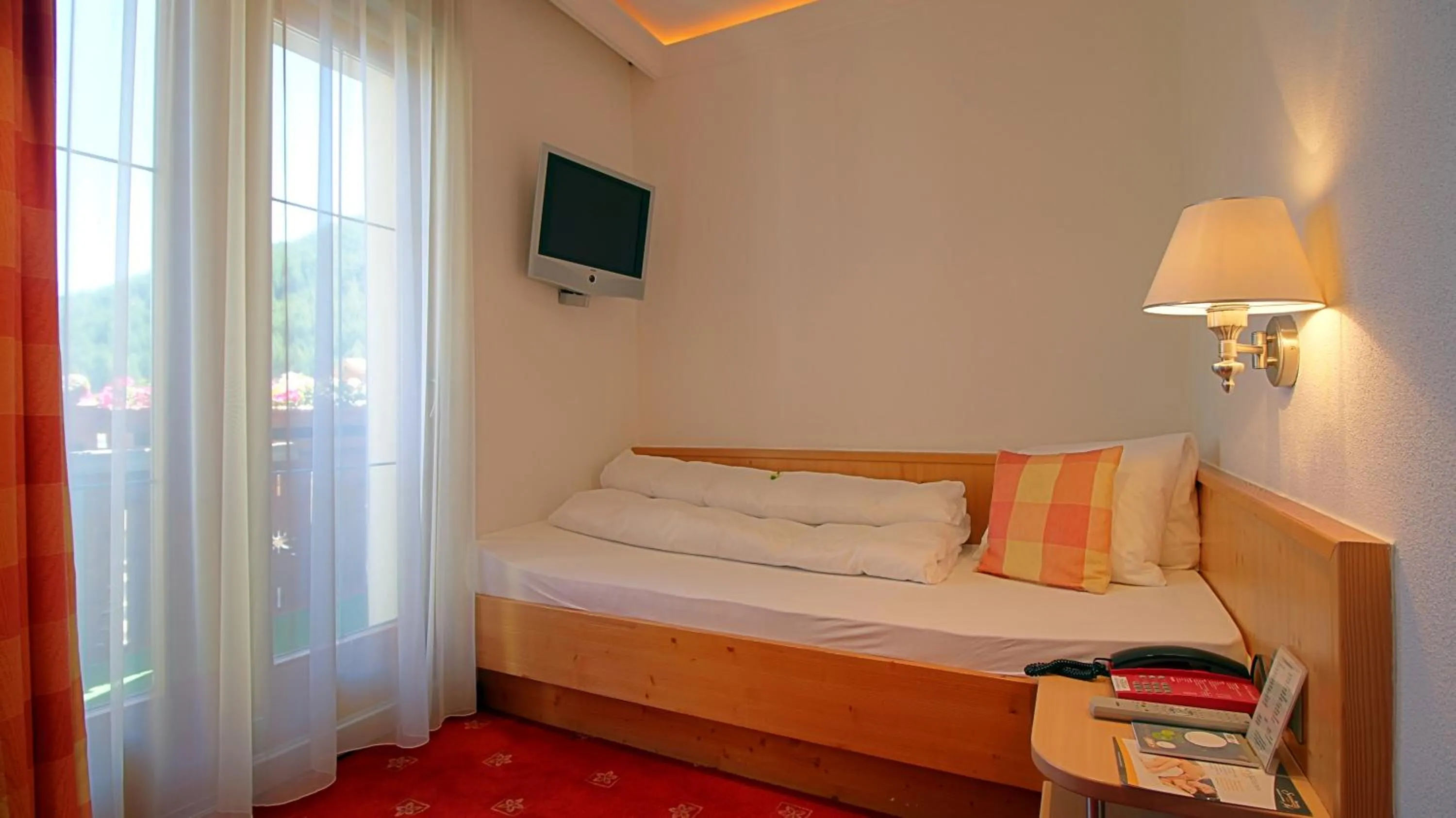 Photo of the whole room, Bed in Samnaunerhof Vital-Hotel