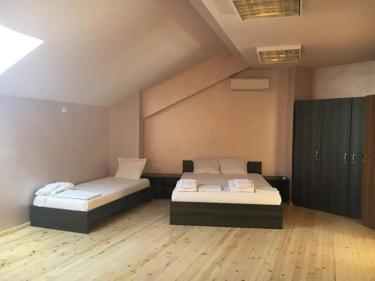 Triple Room with Shared Toilet in The Old House Triple Room with Shared Toilet in The Old House