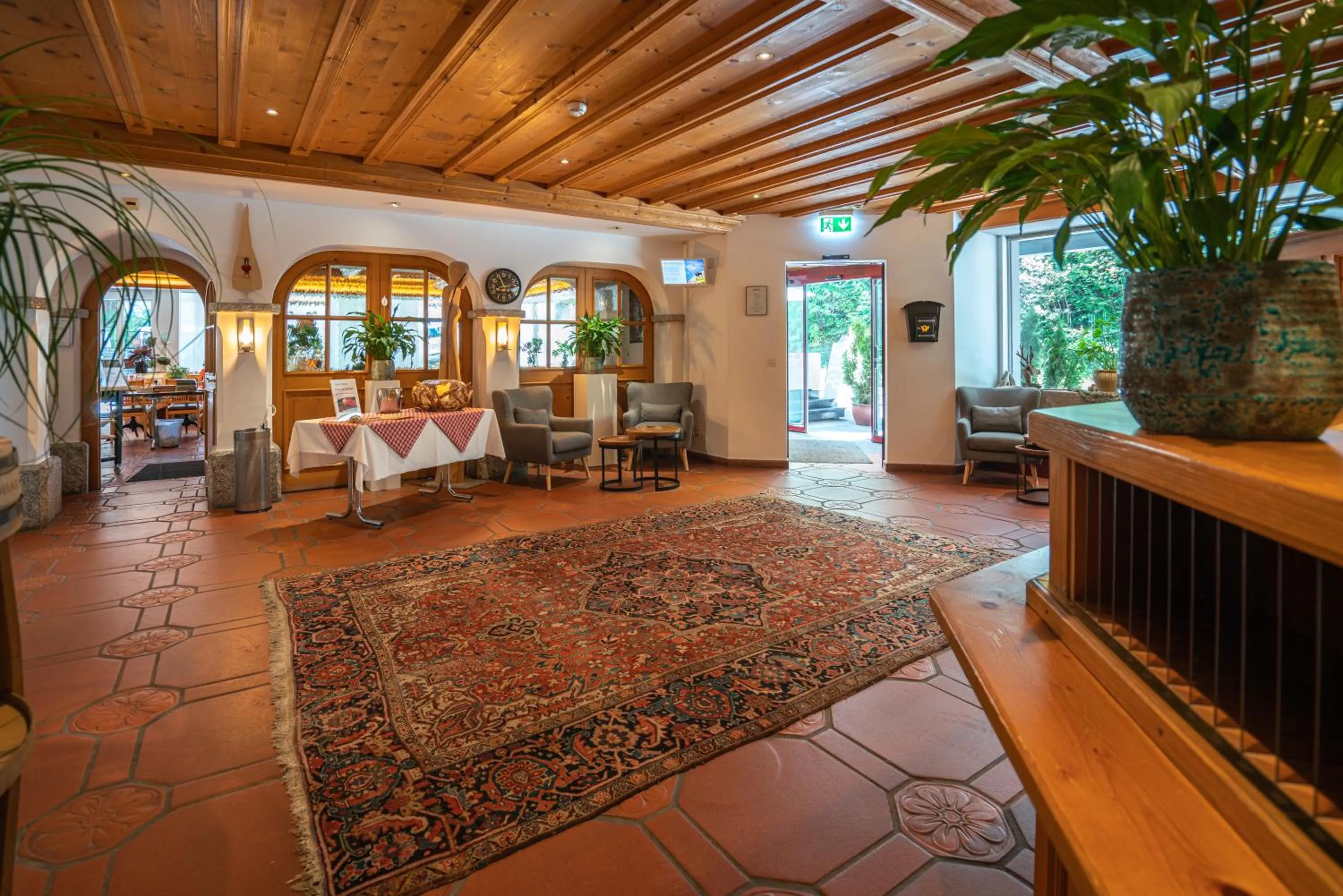 Lobby or reception in Hotel des Alpes