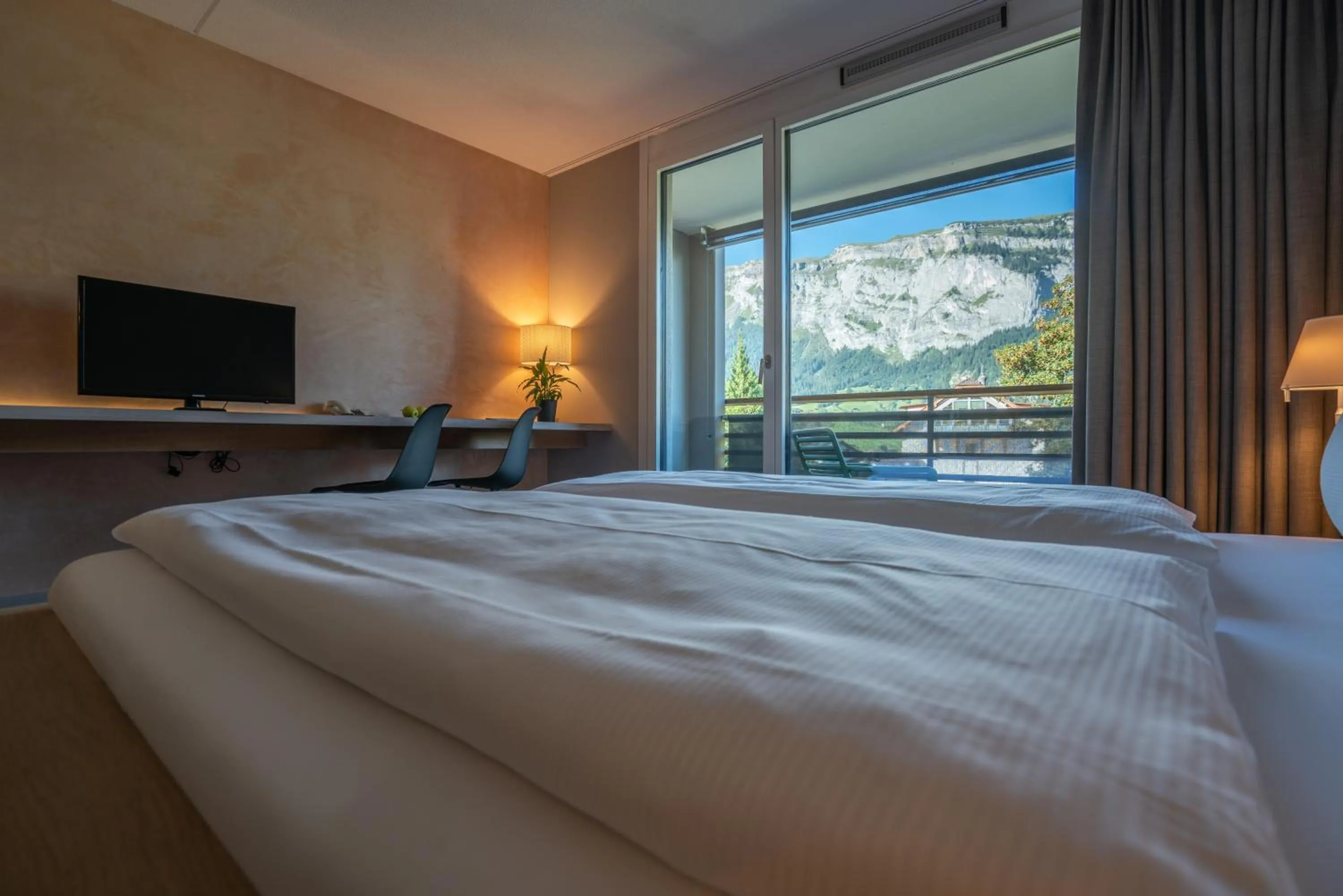 Bed in Hotel des Alpes