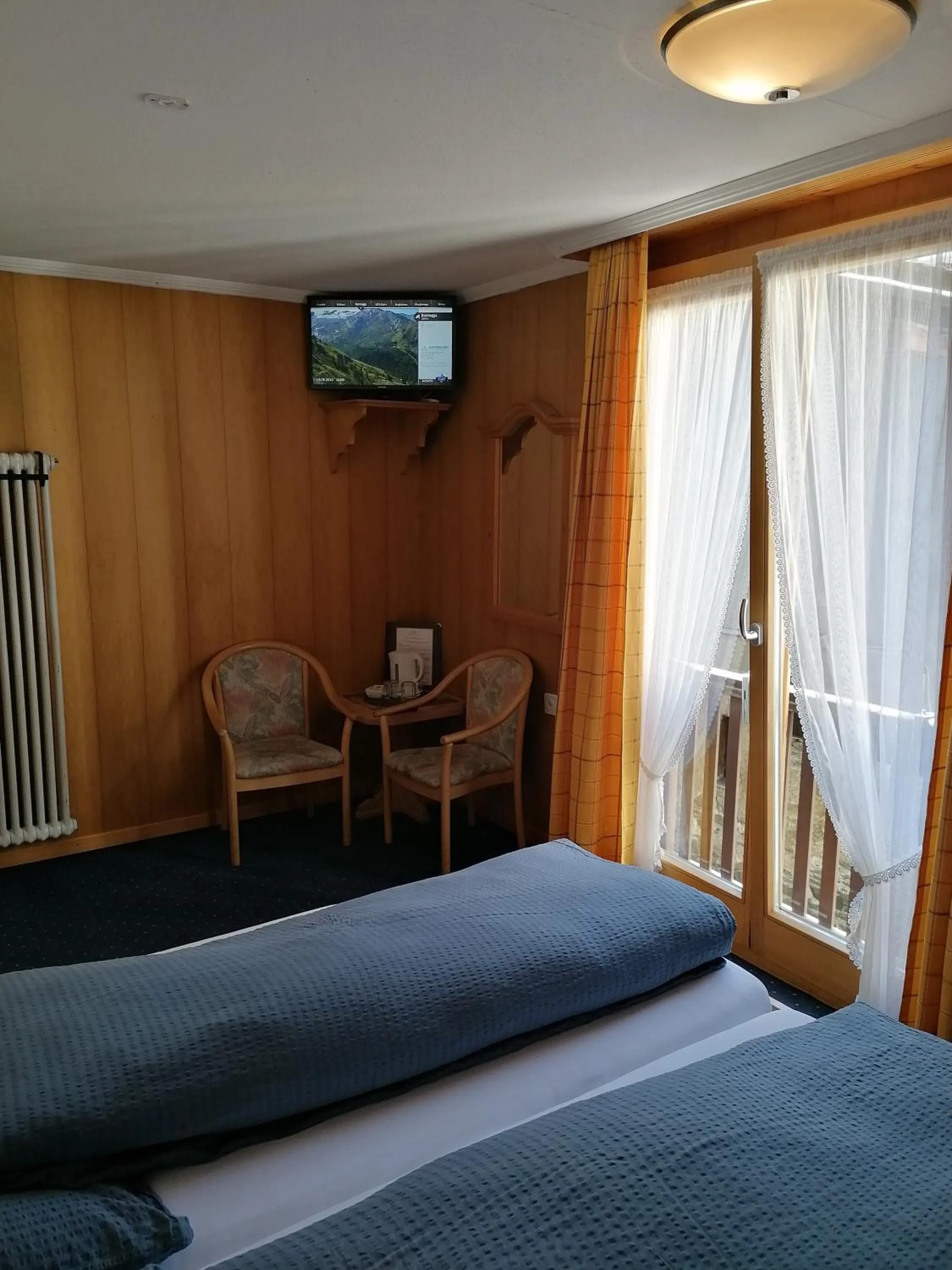 Photo of the whole room, Bed in Petit Helvetia Budget Hotel
