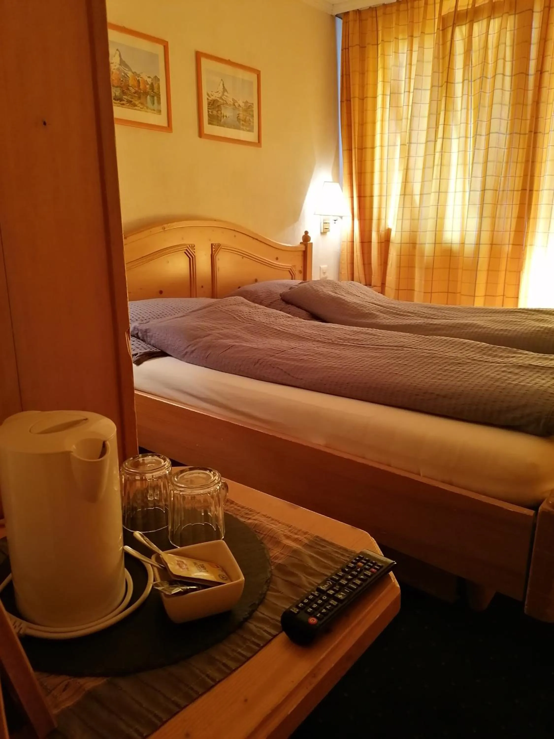 Photo of the whole room, Bed in Petit Helvetia Budget Hotel