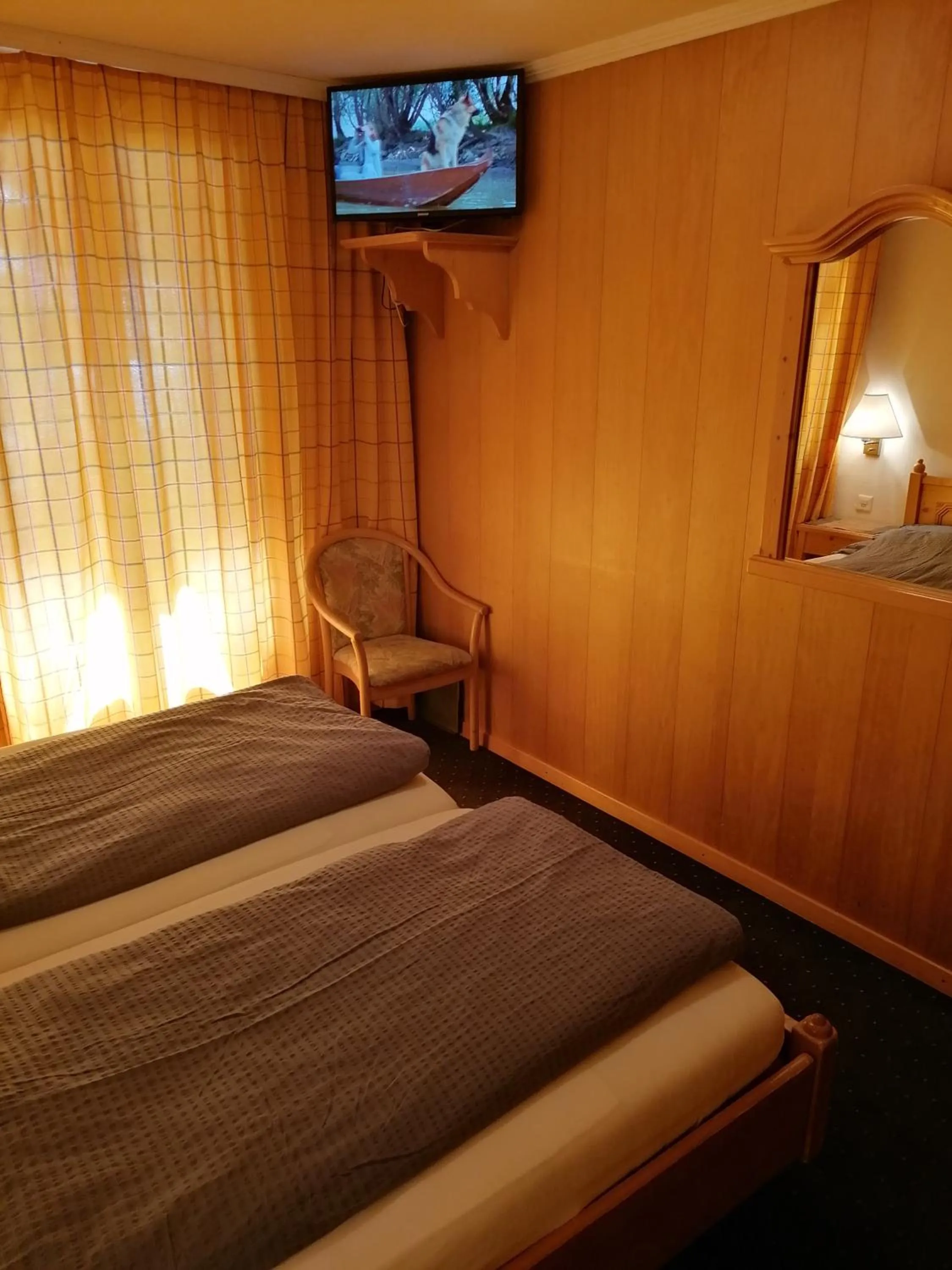 Photo of the whole room, Bed in Petit Helvetia Budget Hotel