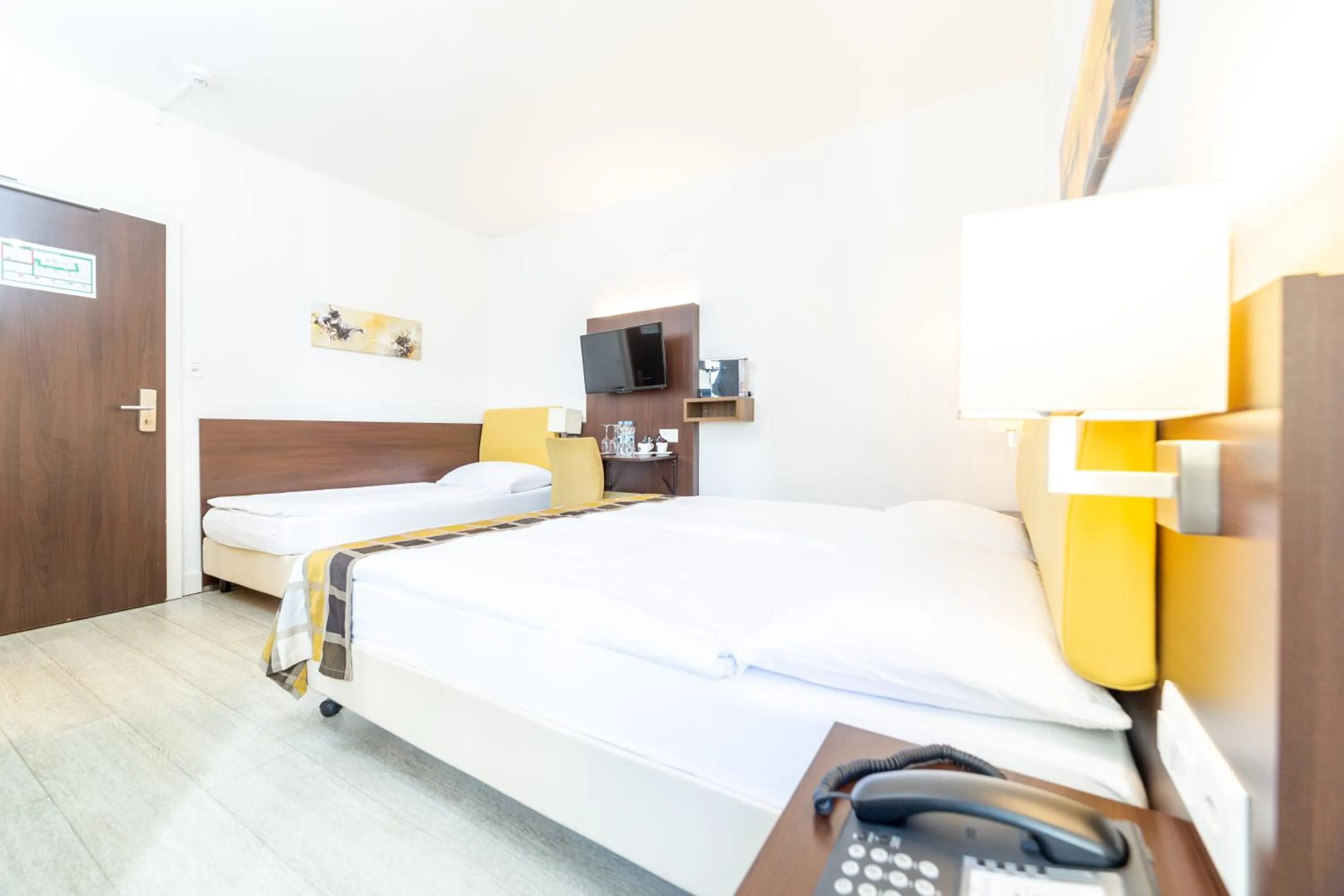 Bed in Hotel Rheinfelderhof