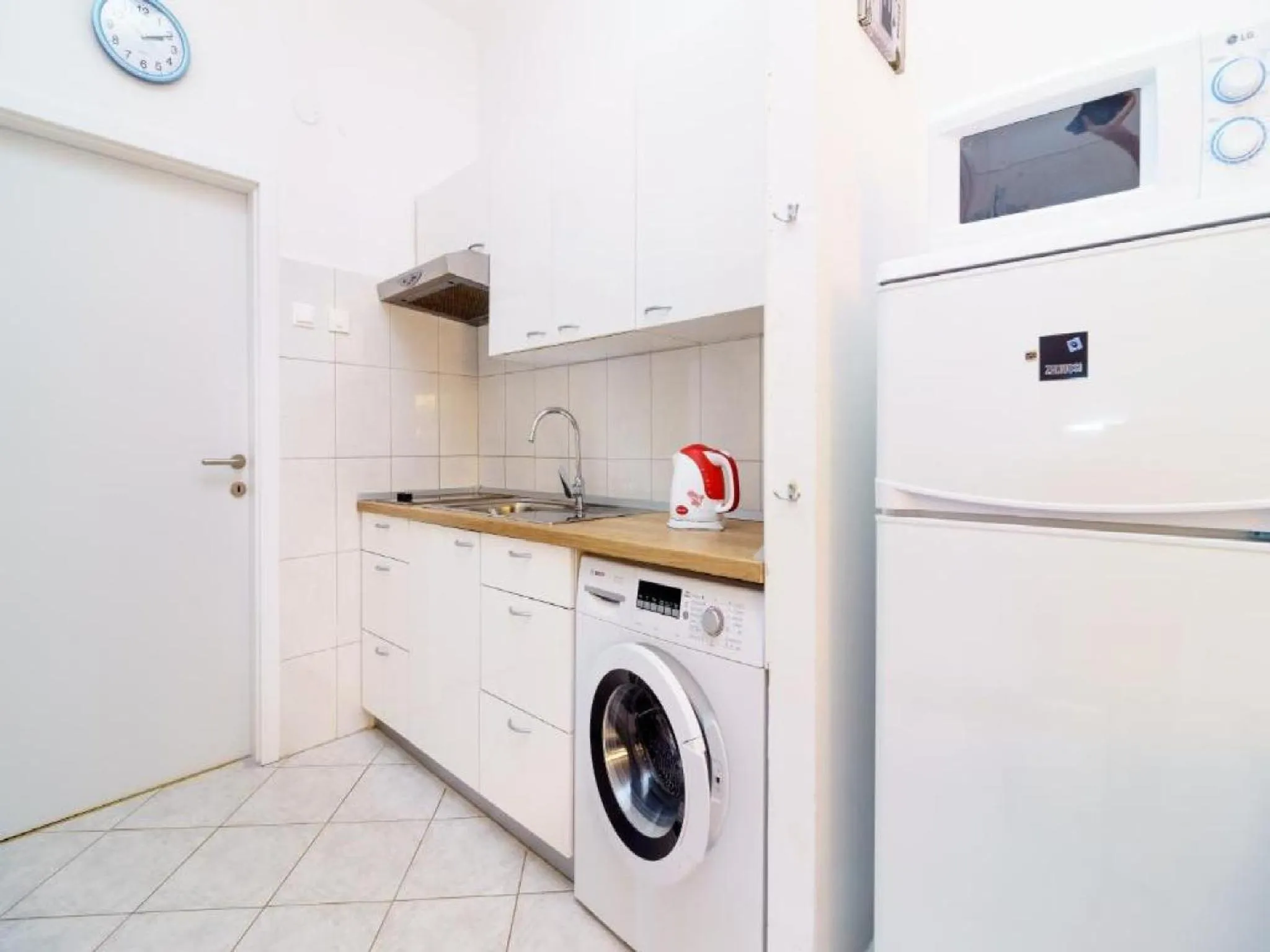 Kitchen or kitchenette in Lumbarda Resort Apartments