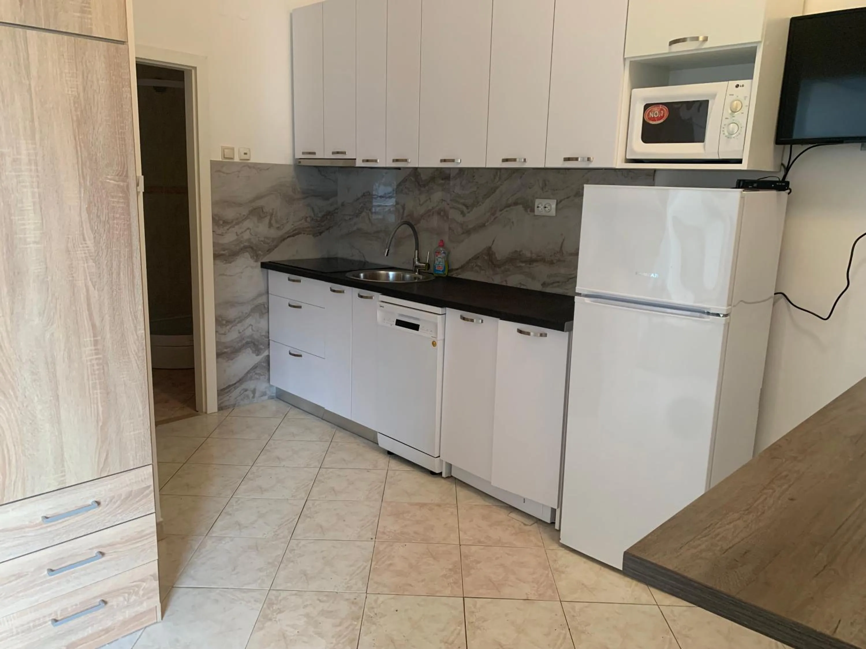 kitchen in Lumbarda Resort Apartments